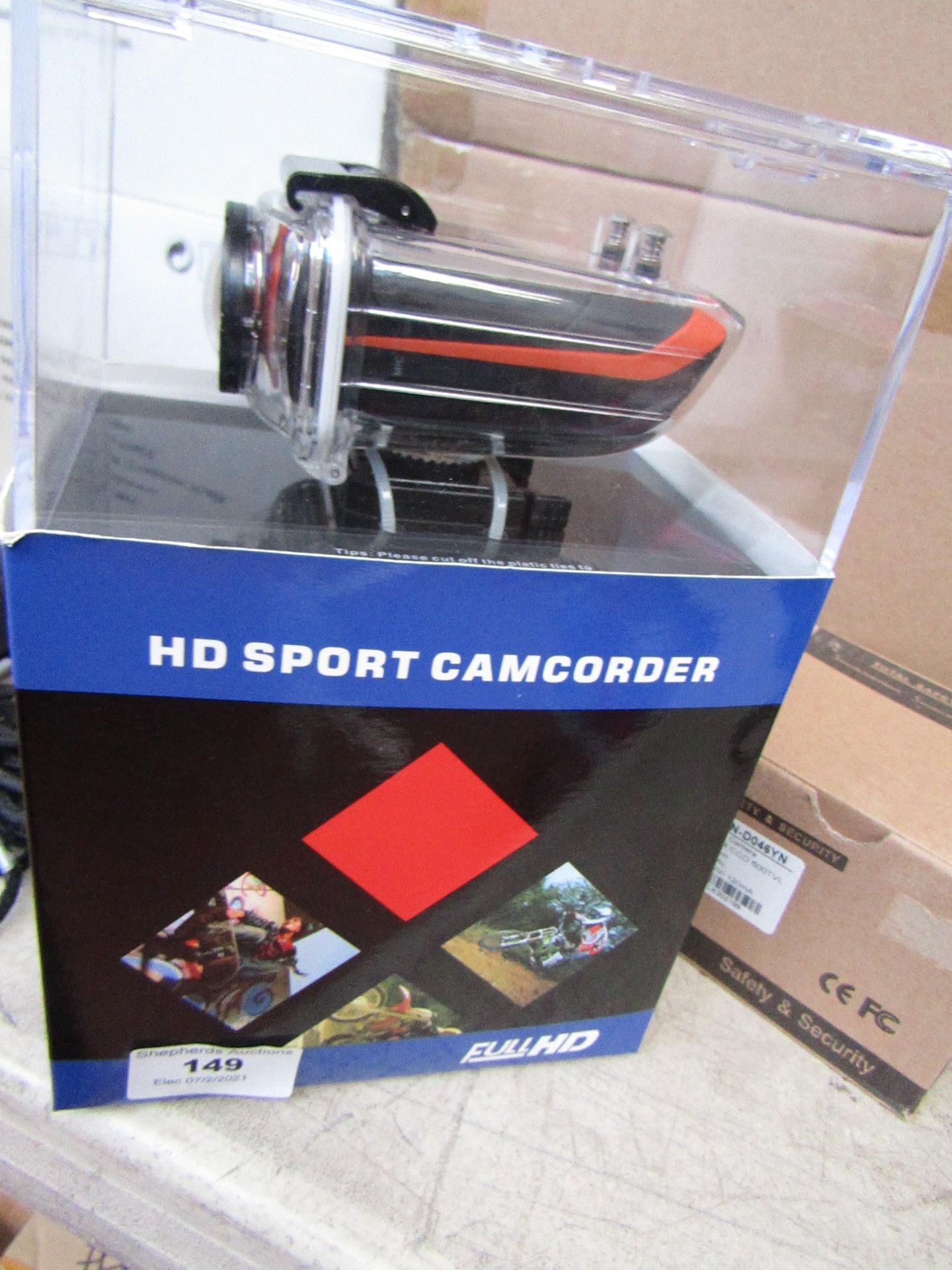 HD sport action camcorder with accessories, tested working and boxed.