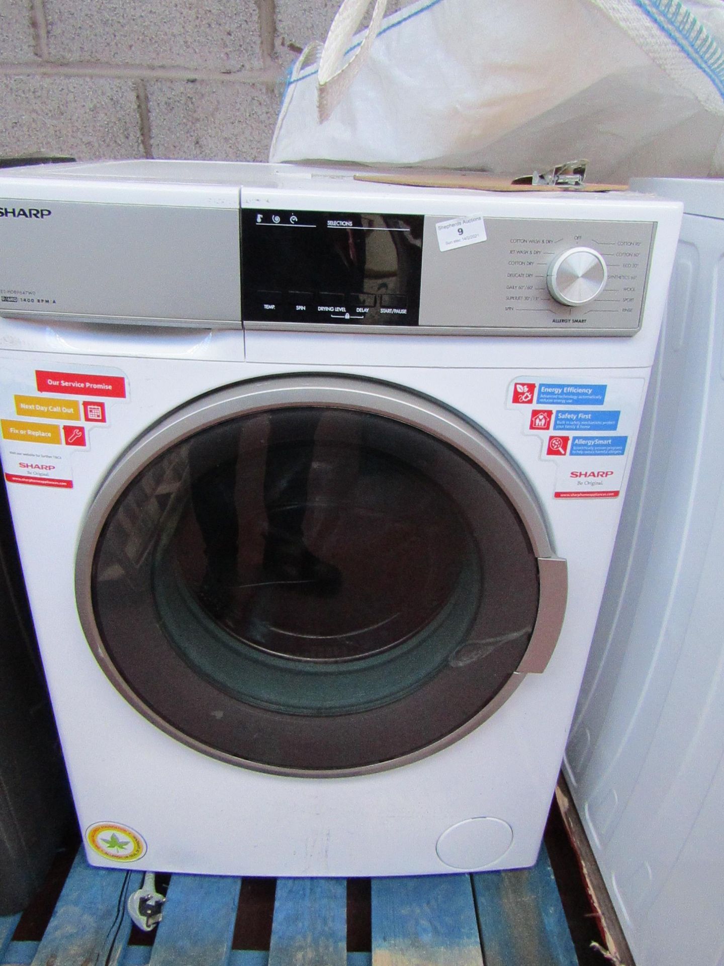 Sharp 9/6kg washer dryer, powers on ands spins but heat and other functions untested.