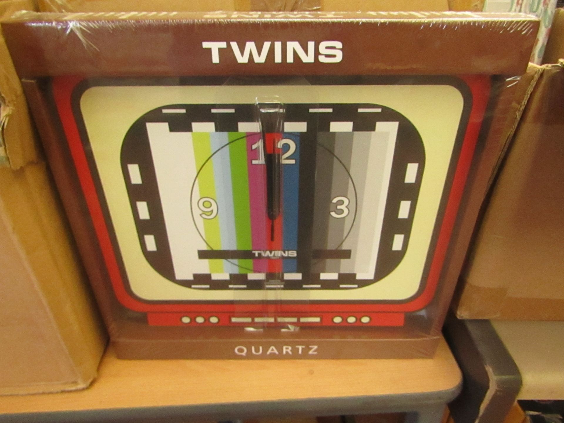 4 x Twins Quartz Wall Clocks new & packaged see image for design
