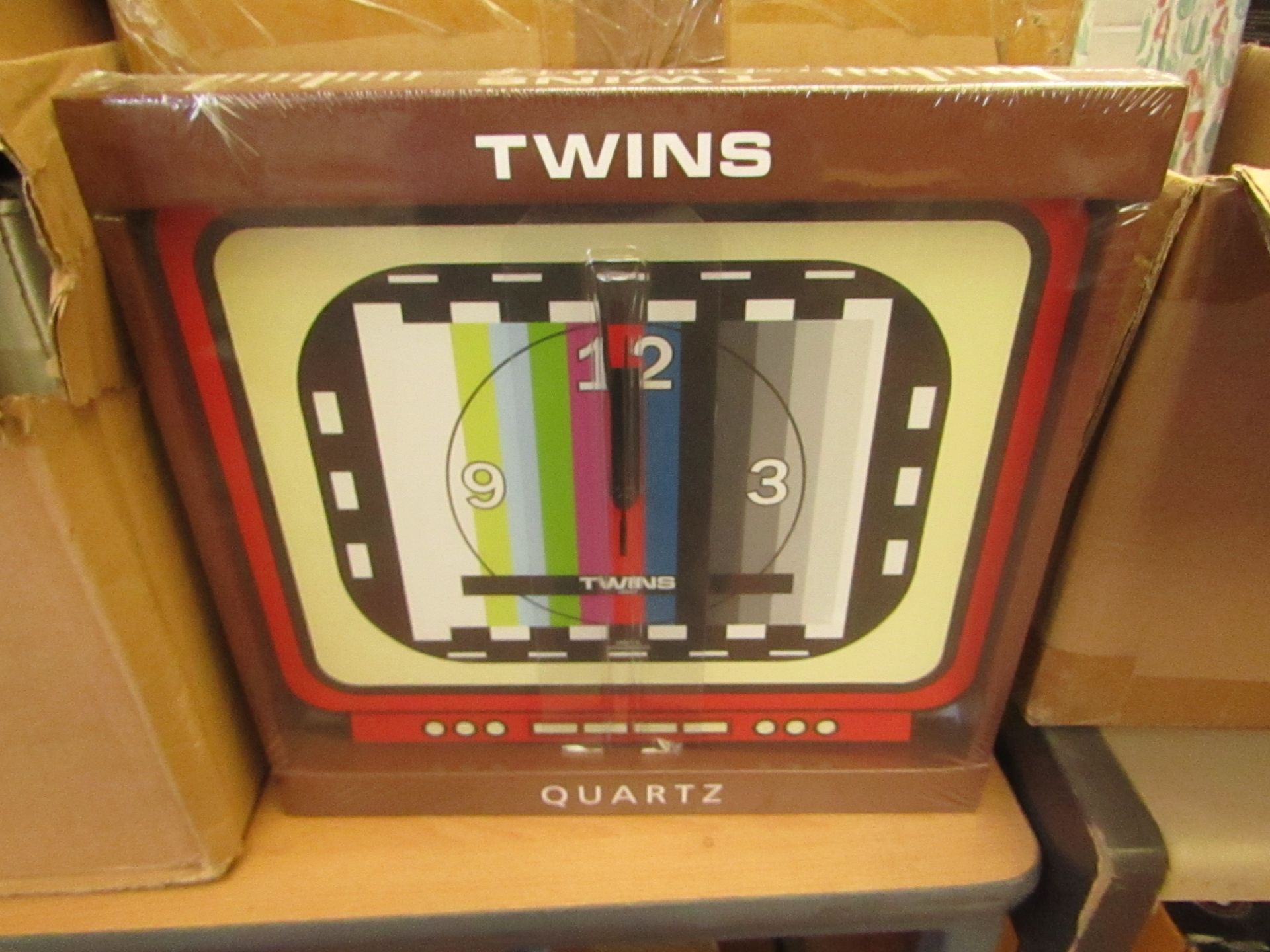 4 x Twins Quartz Wall Clocks new & packaged see image for design