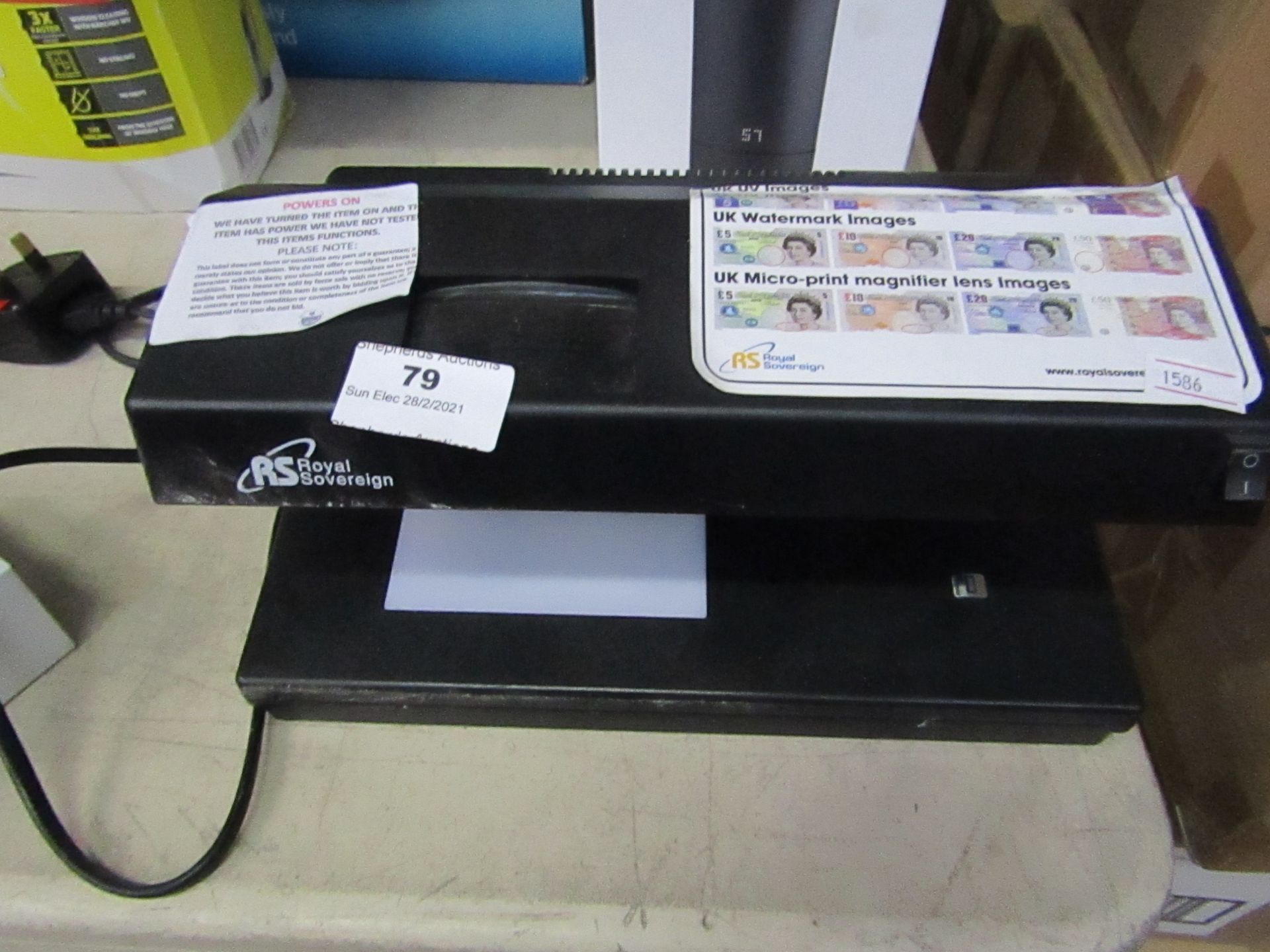 Royal Sovereign counterfeit detector, powers on but not tested all functions.