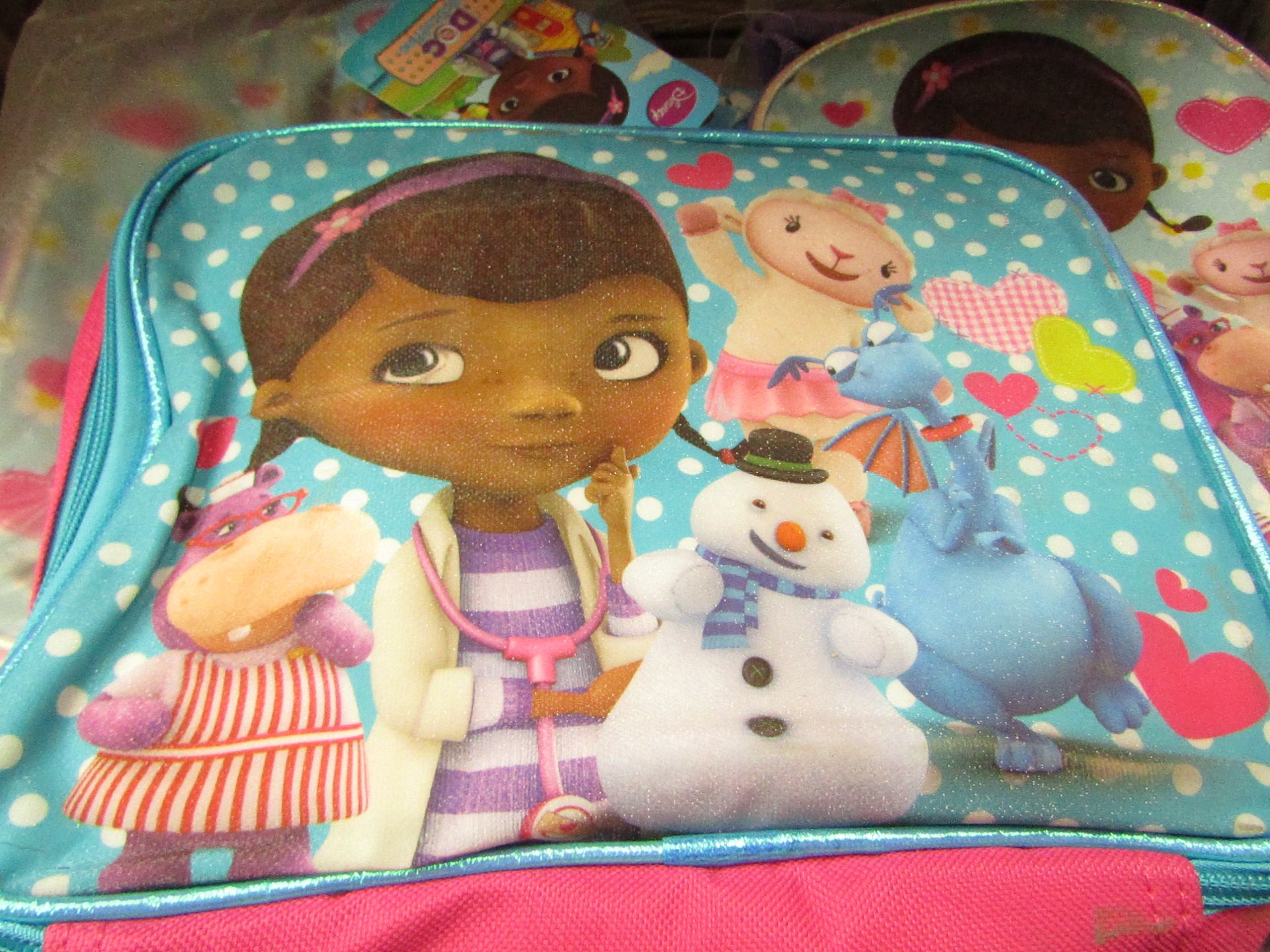 24x Disney Junior - Doc Mcstuffins Fabric Lunch Box RRP £5.49 each- New & Packaged.