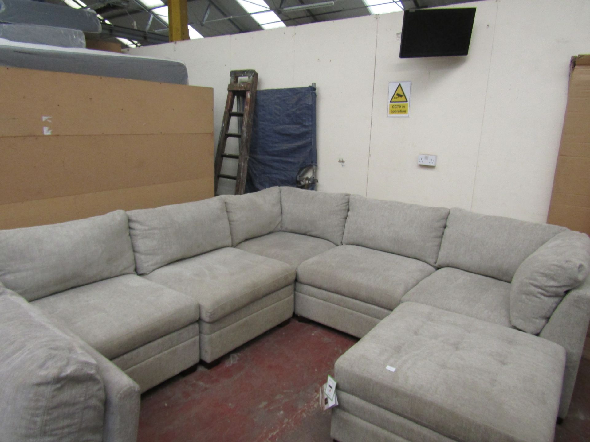 Mstar 6 piece sectional sofa, looks like a ex display as still has the tags on a few pieces