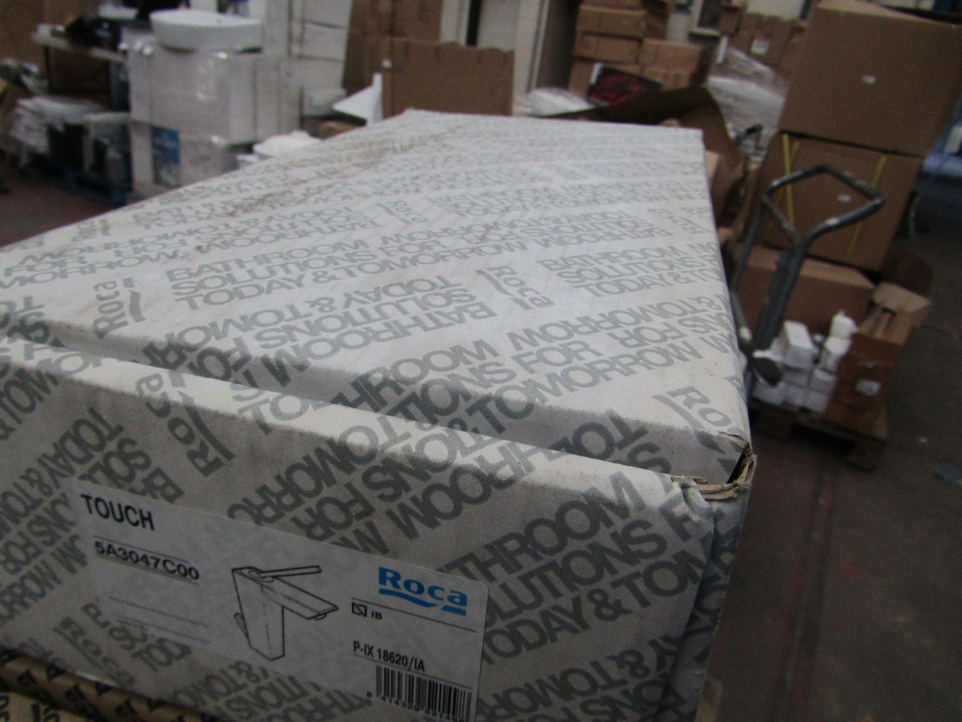 Roca Touch basin mixer, new and boxed.