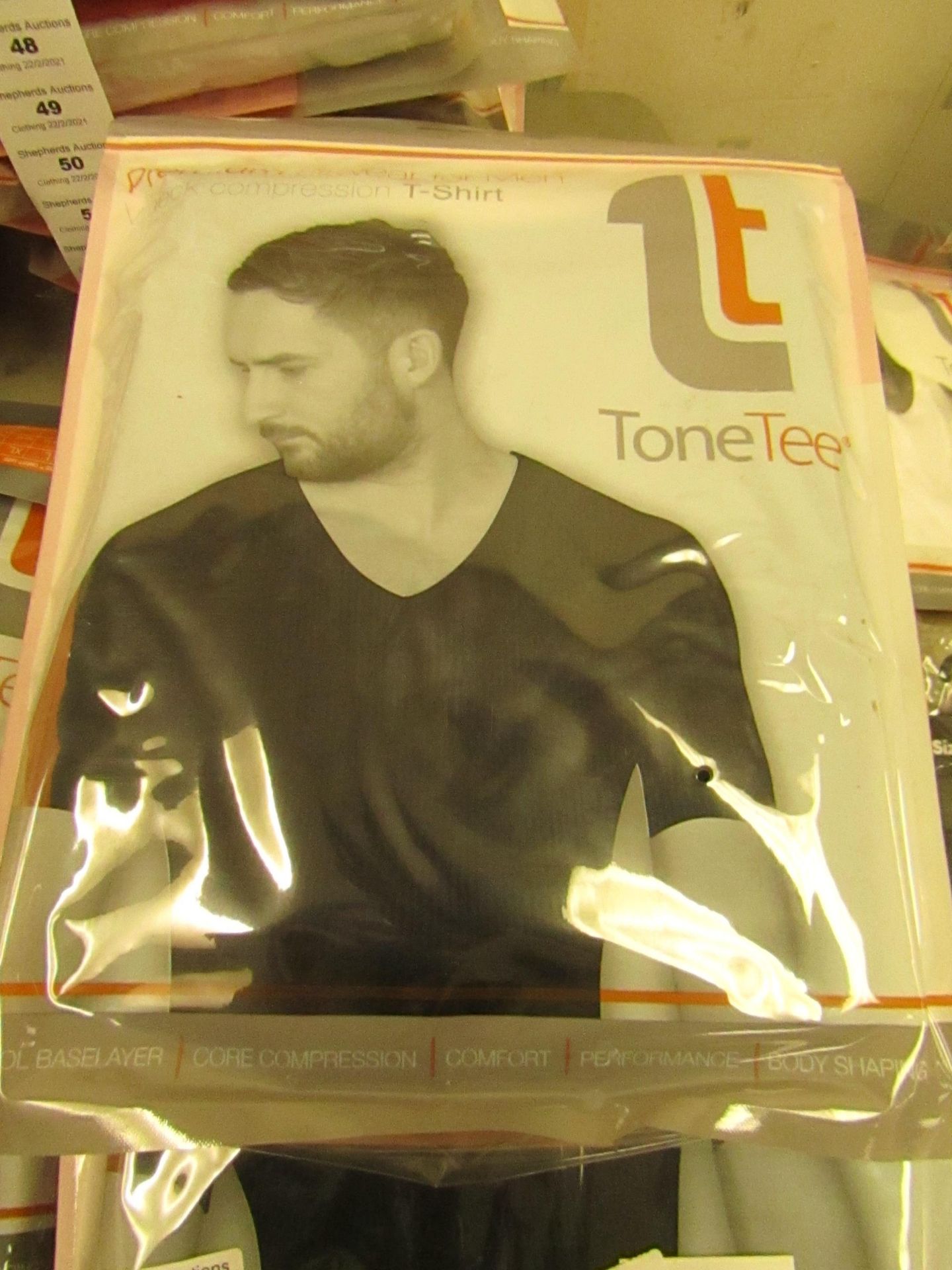 | 1x | MENS TONE TEE NECK COMPRESSION T-SHIRT BLACK SIZE L | NEW & PACKAGED |