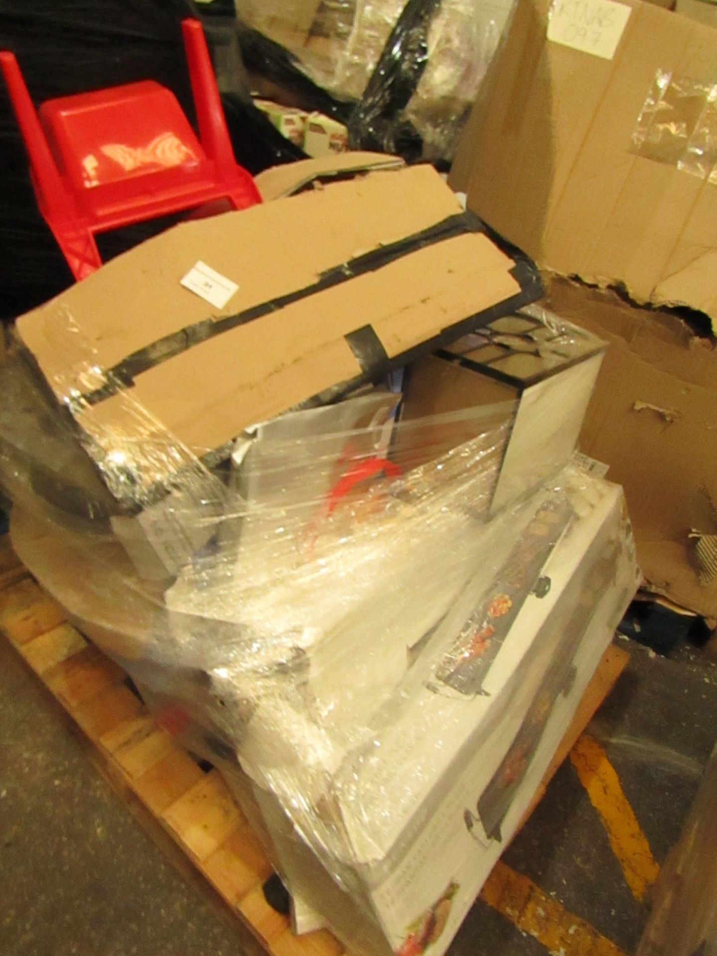 A pallet of unmanifested raw return stock which looks to be mainly Toys, all in unchecked.