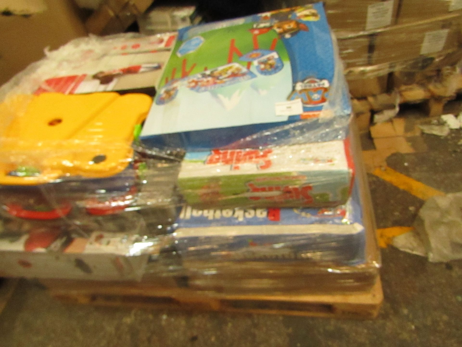 A pallet of unmanifested raw return stock which looks to be mainly Toys, all in unchecked.