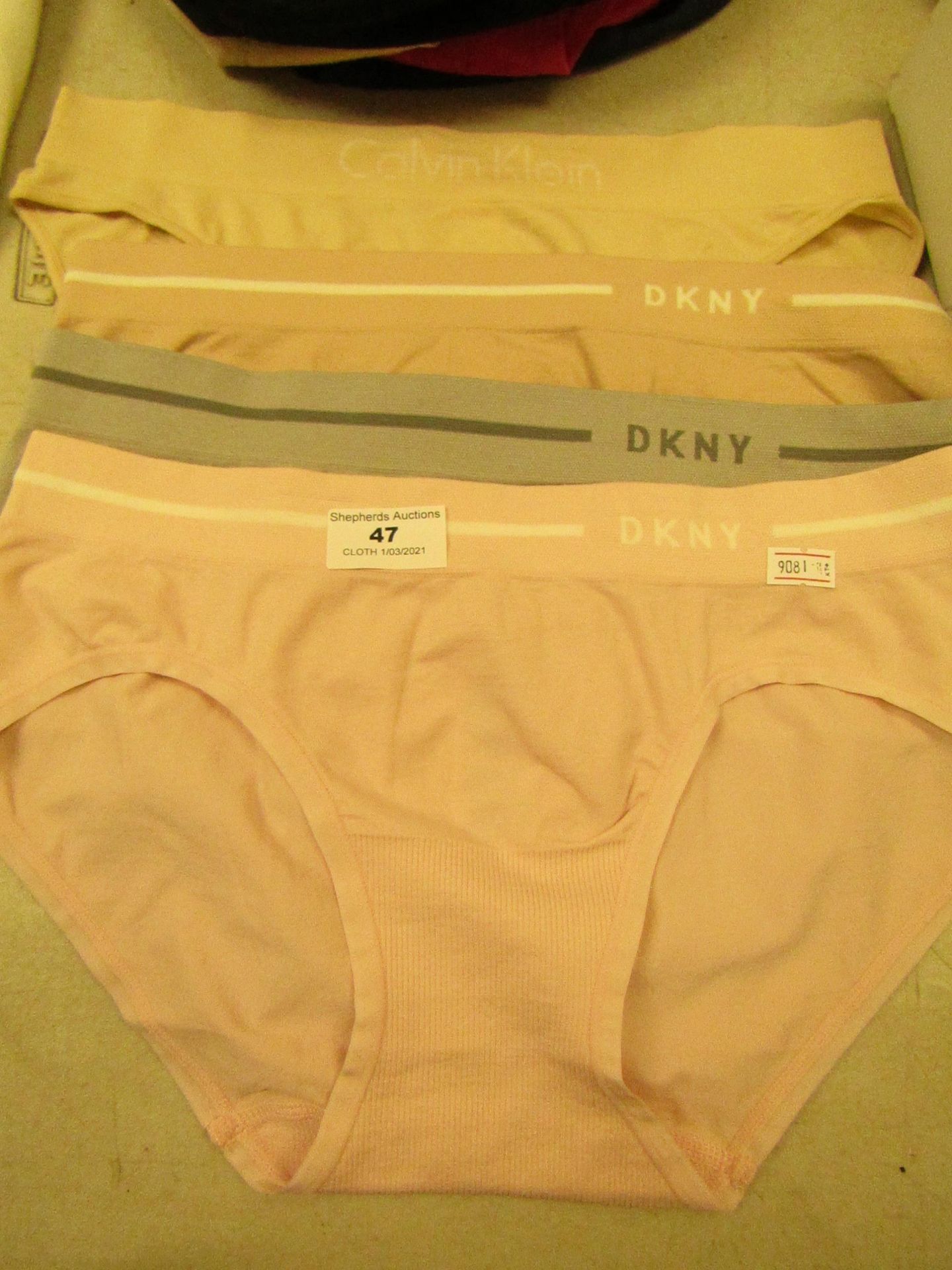 4 items being 3 x DKNY Kinckers size M & 1 x Calvin Klein Knickers no packaging