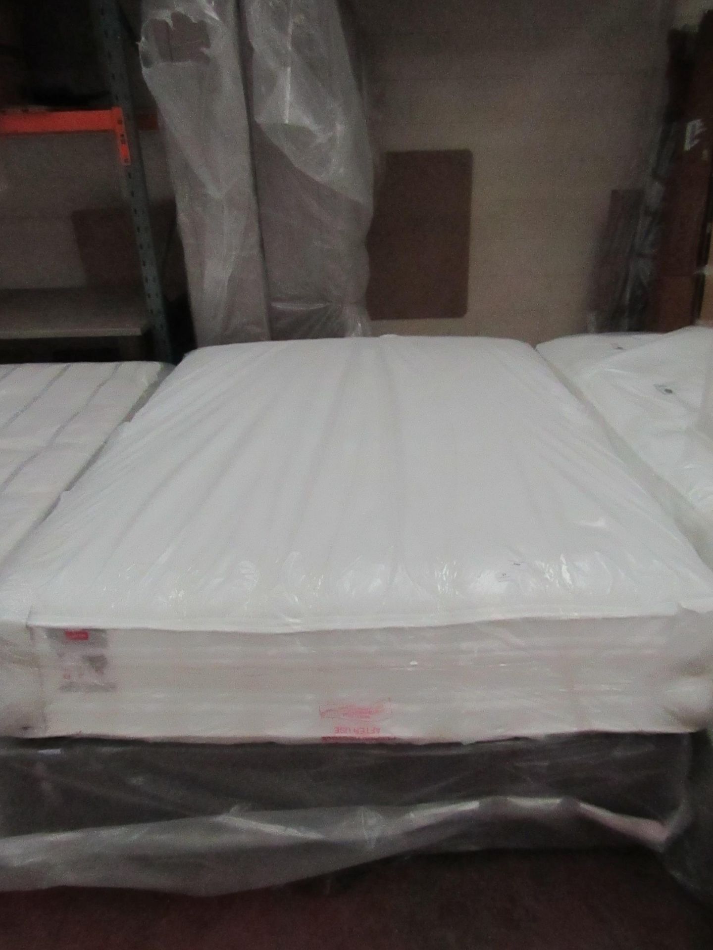 Slumberland Kingsize mattress with divan base, ex-display so item may contain a few marks etc.