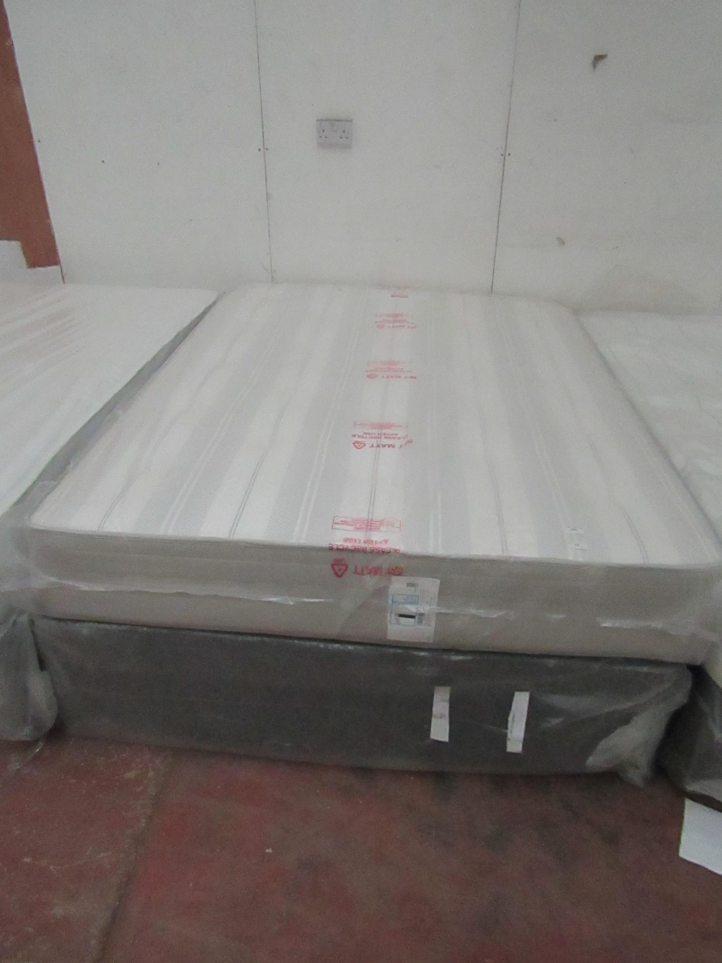 Vancouver kingsize mattress with divan base, ex-display so item may contain a few marks etc.