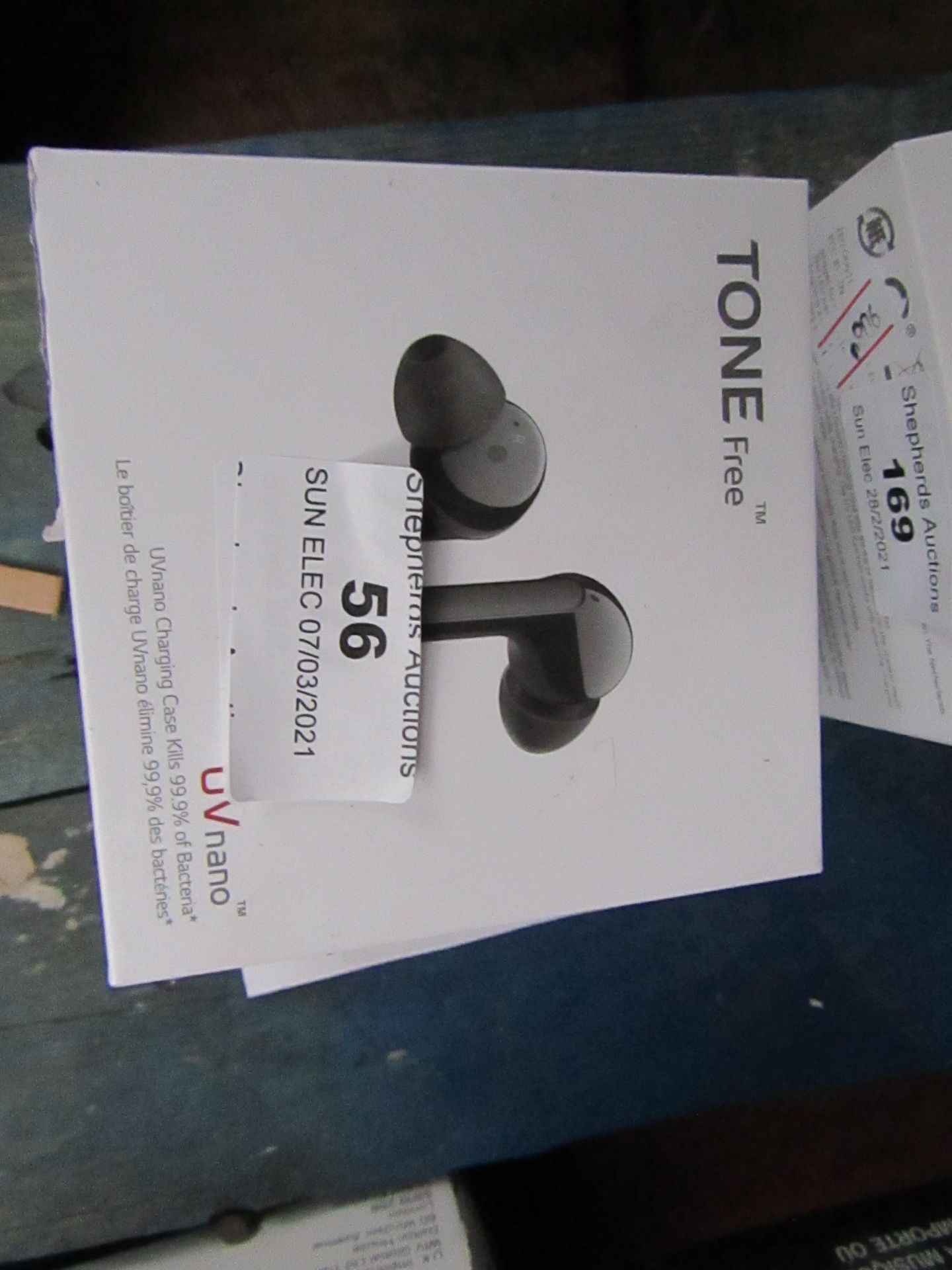 LG Tone Free Wireless earphones with charging case, unchecked as they have run out of charge, RRP £