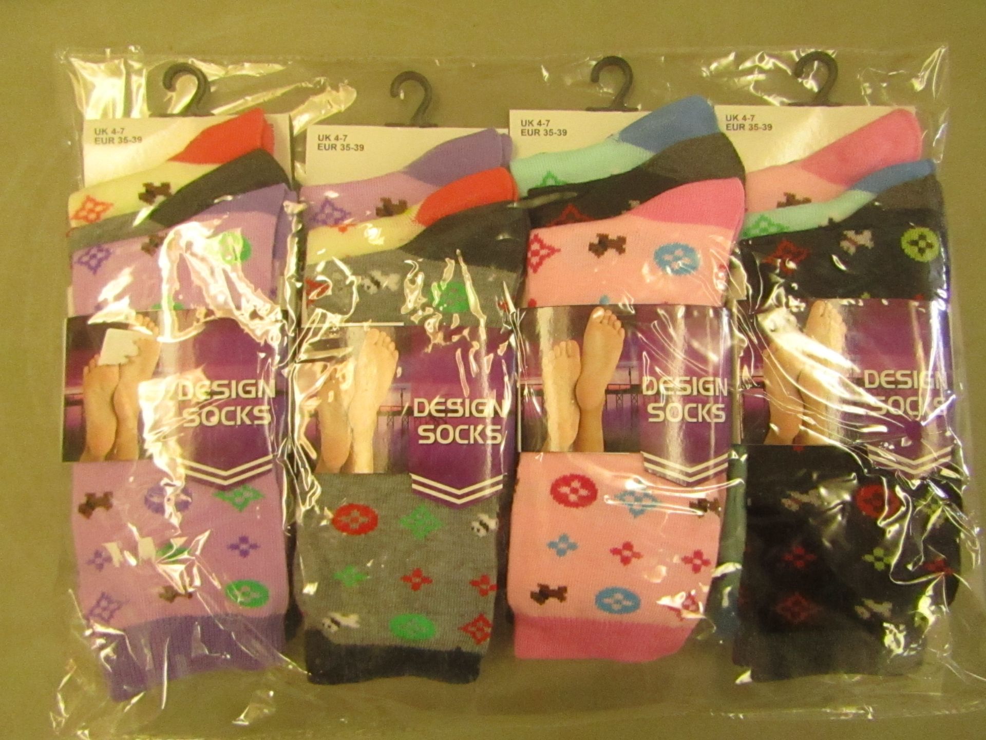 12 Pairs of Ladies Design Socks Size 4-7 New & Packaged