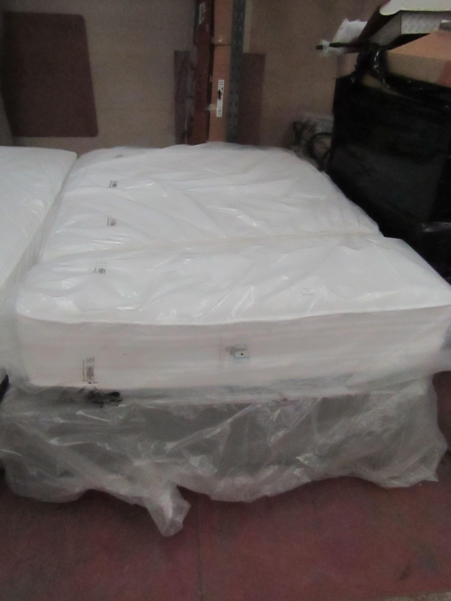 Kingsize mattress with divan base, ex-display so item may contain a few marks etc.