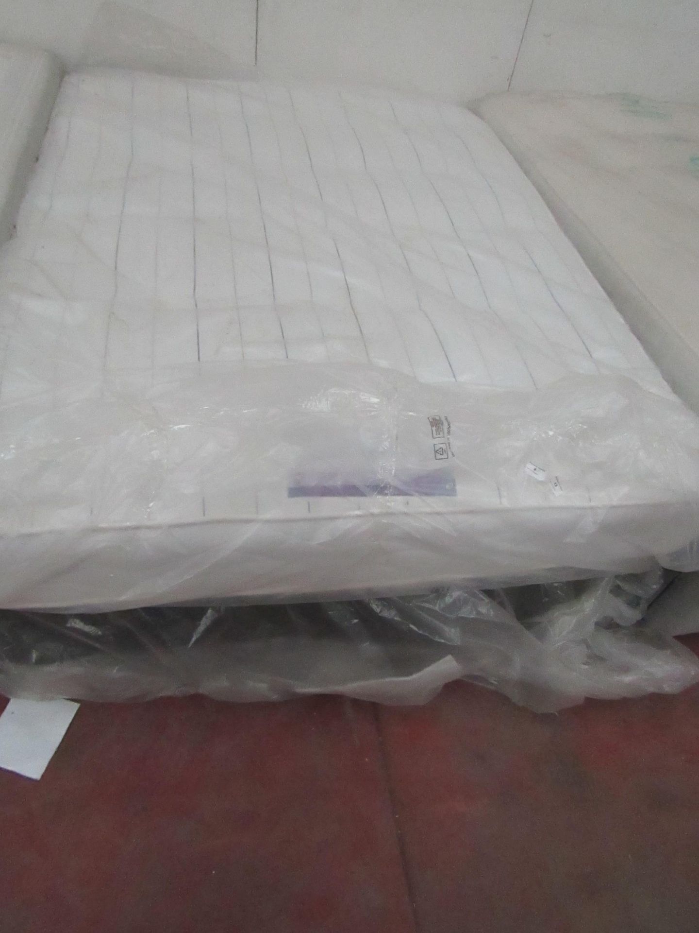 Sealy kingsize mattress with divan base, ex-display so item may contain a few marks etc.