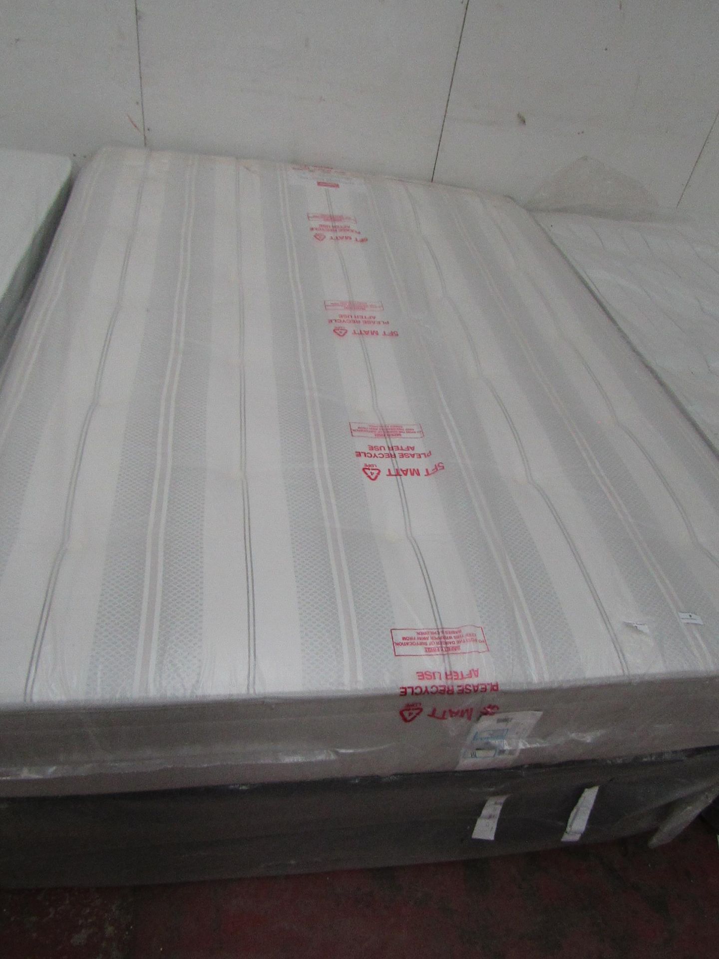 Vancouver kingsize mattress with divan base, ex-display so item may contain a few marks etc.