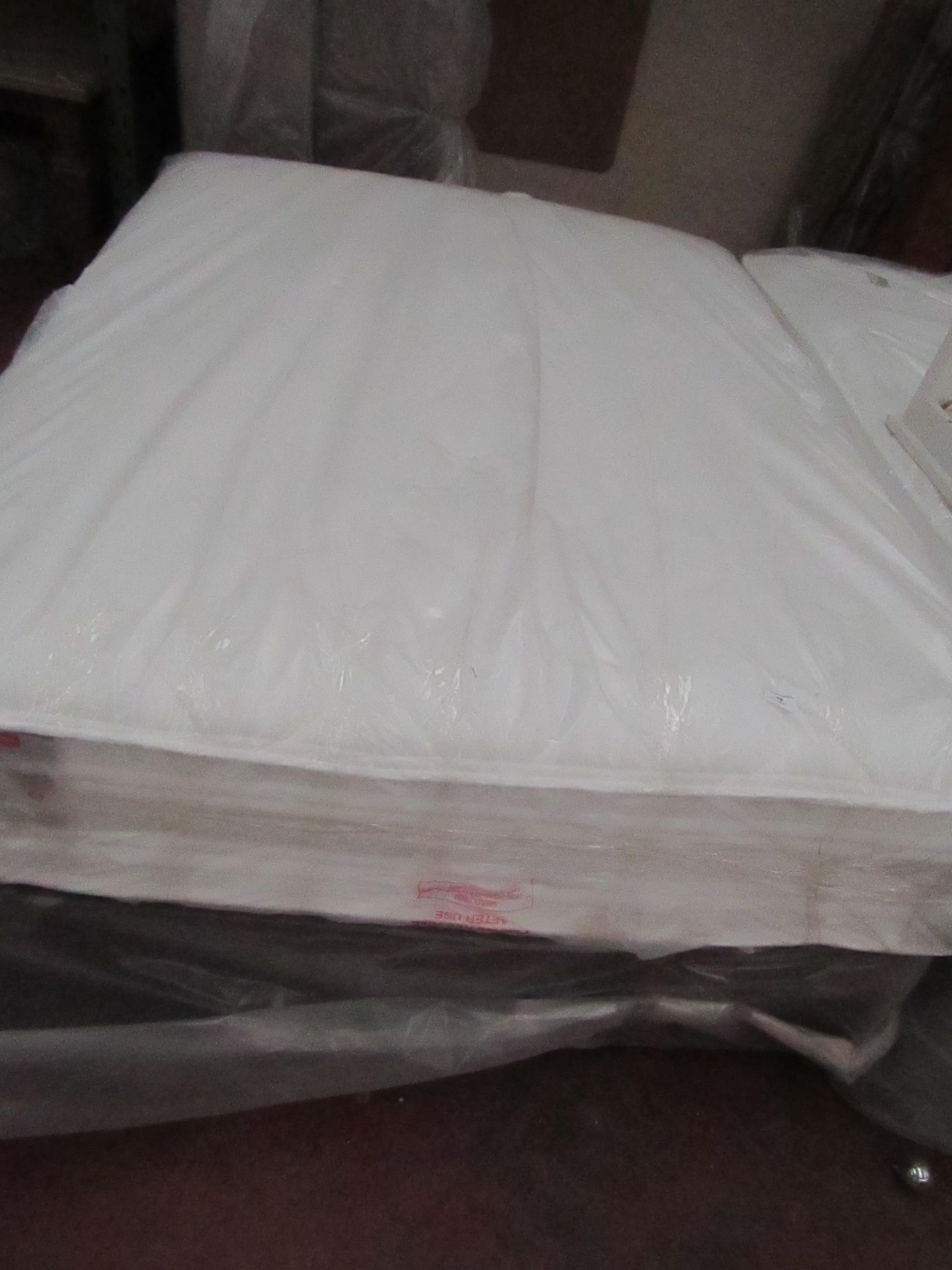 Slumberland Kingsize mattress with divan base, ex-display so item may contain a few marks etc.