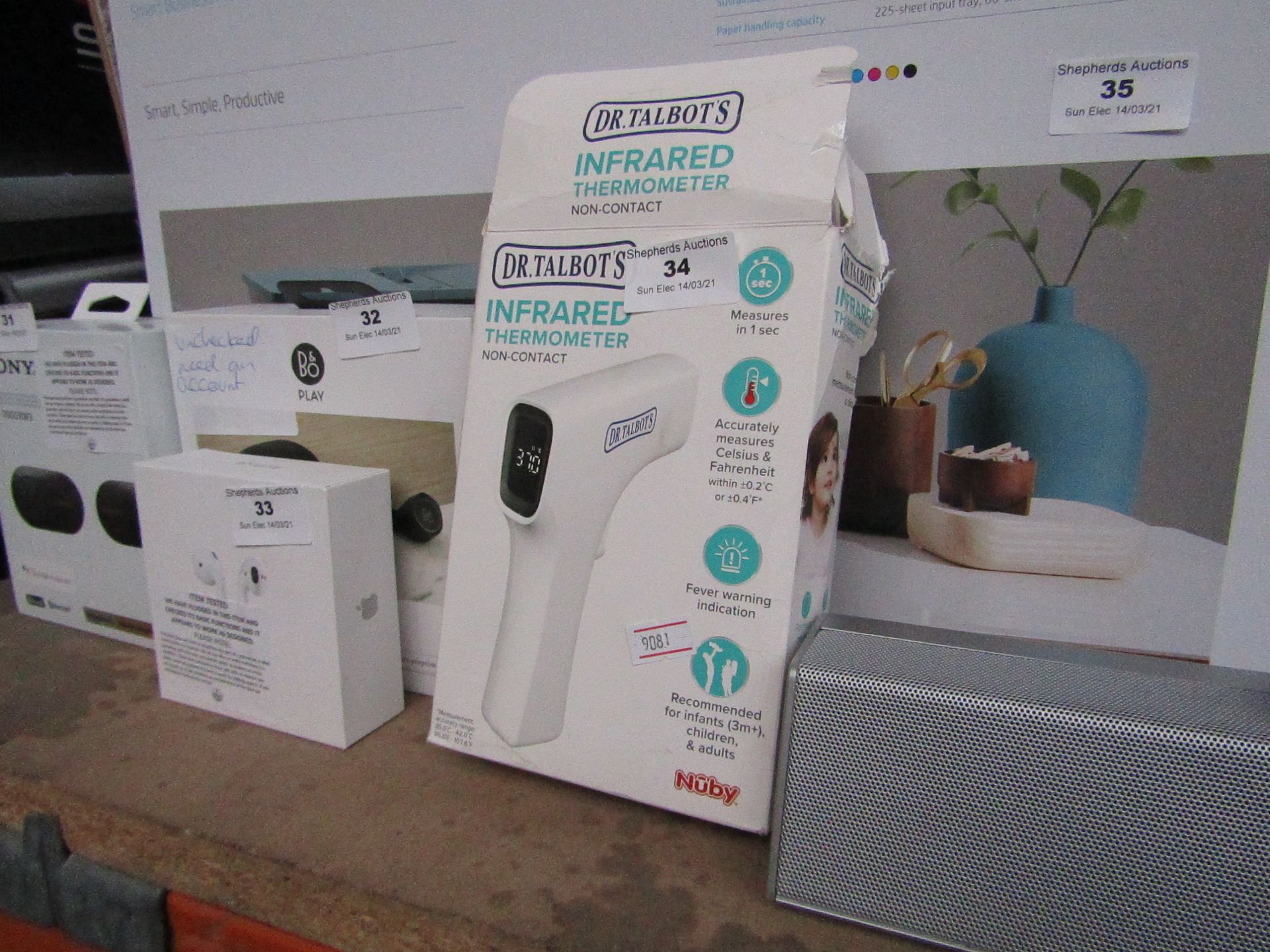 Dr. Talbots infrared thermometer, unchecked and boxed.