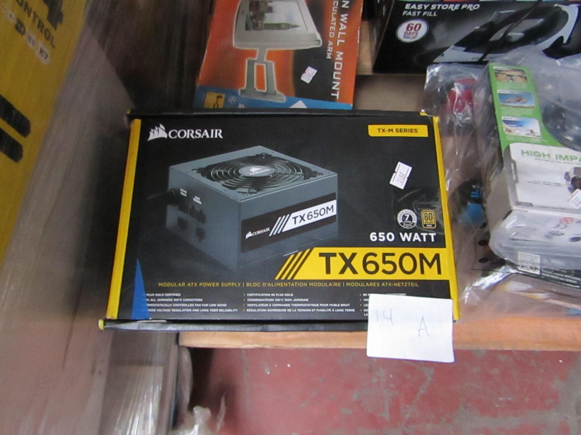 Corsair TX650M modular ATX power supply, unchecked and boxed.