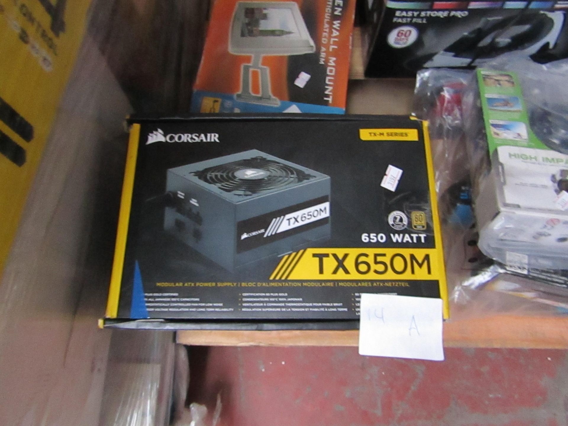 Corsair TX650M modular ATX power supply, unchecked and boxed.