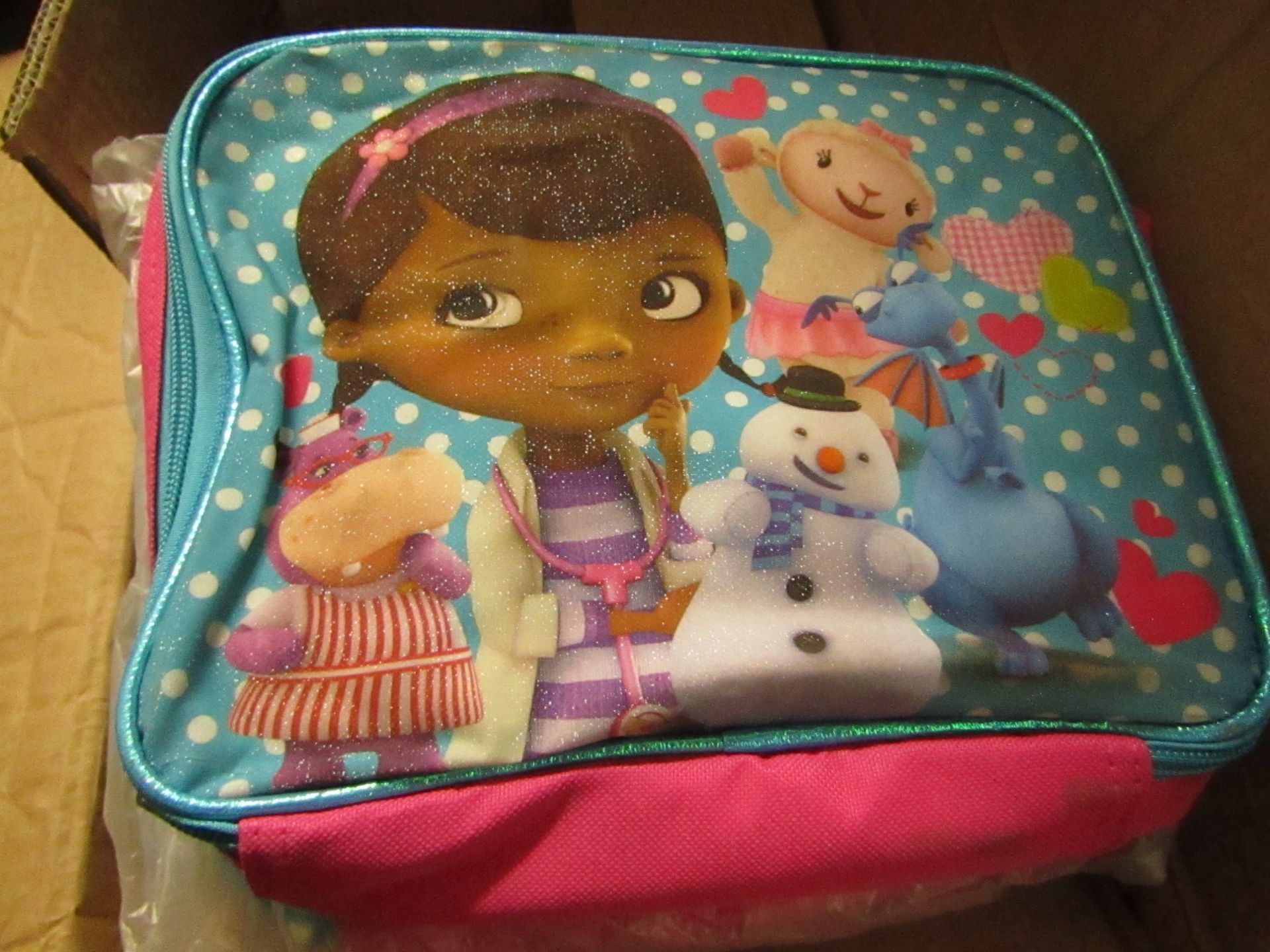 24x Disney Junior - Doc Mcstuffins Fabric Lunch Box RRP £5.49 each - New & Packaged.