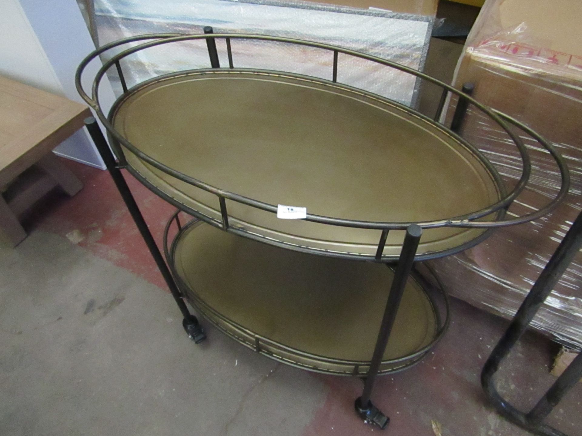 | 1x | COX & COX ONE WORLD GRANVILLE OVAL IRON DRINKS TROLLEY | SCRATCHES PRESENT ON TOP BASE |