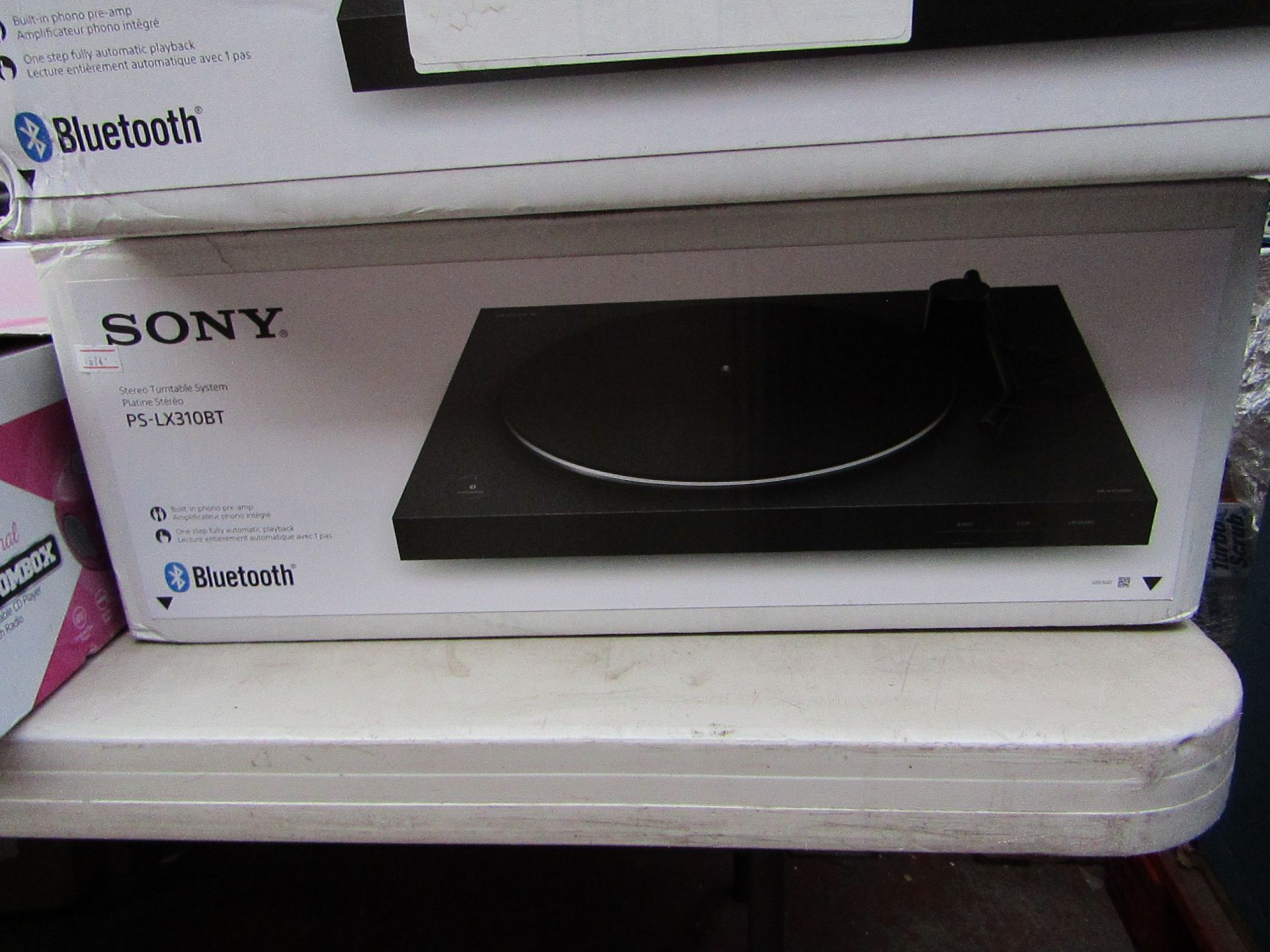 Sony PS-LX310BT stereo turntable, unchecked and boxed.