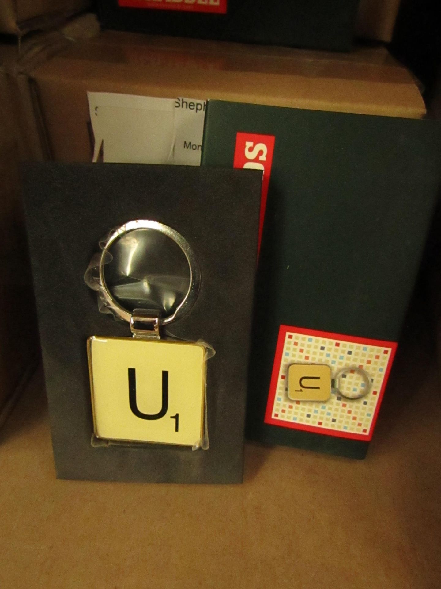 5x Boxes Containing 4 Items Per Box - Scrabble - U1 Keyring's - All New & Boxed.