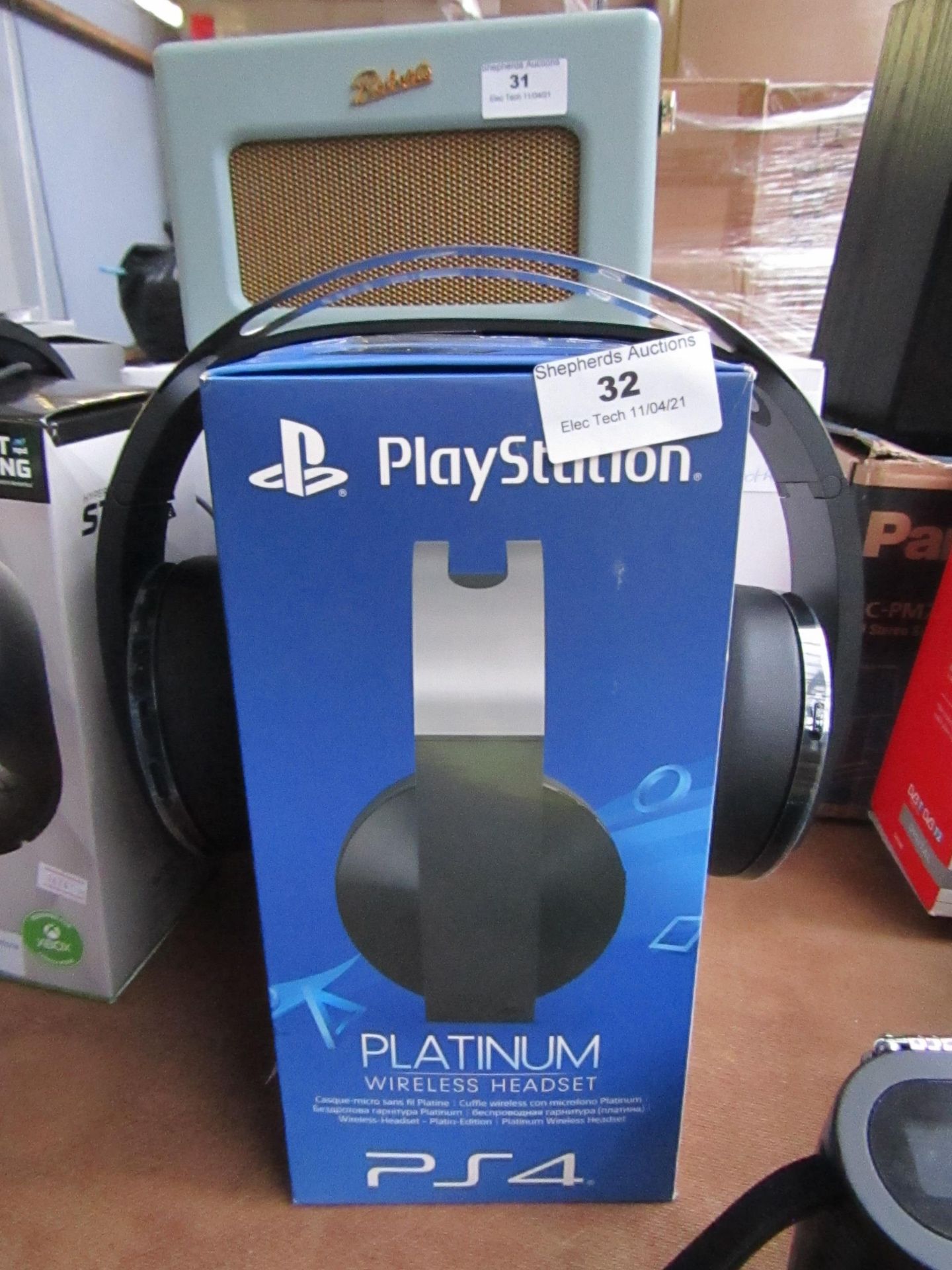 PS4 Platinum wireless headset, unchercked due to no charge and boxed.