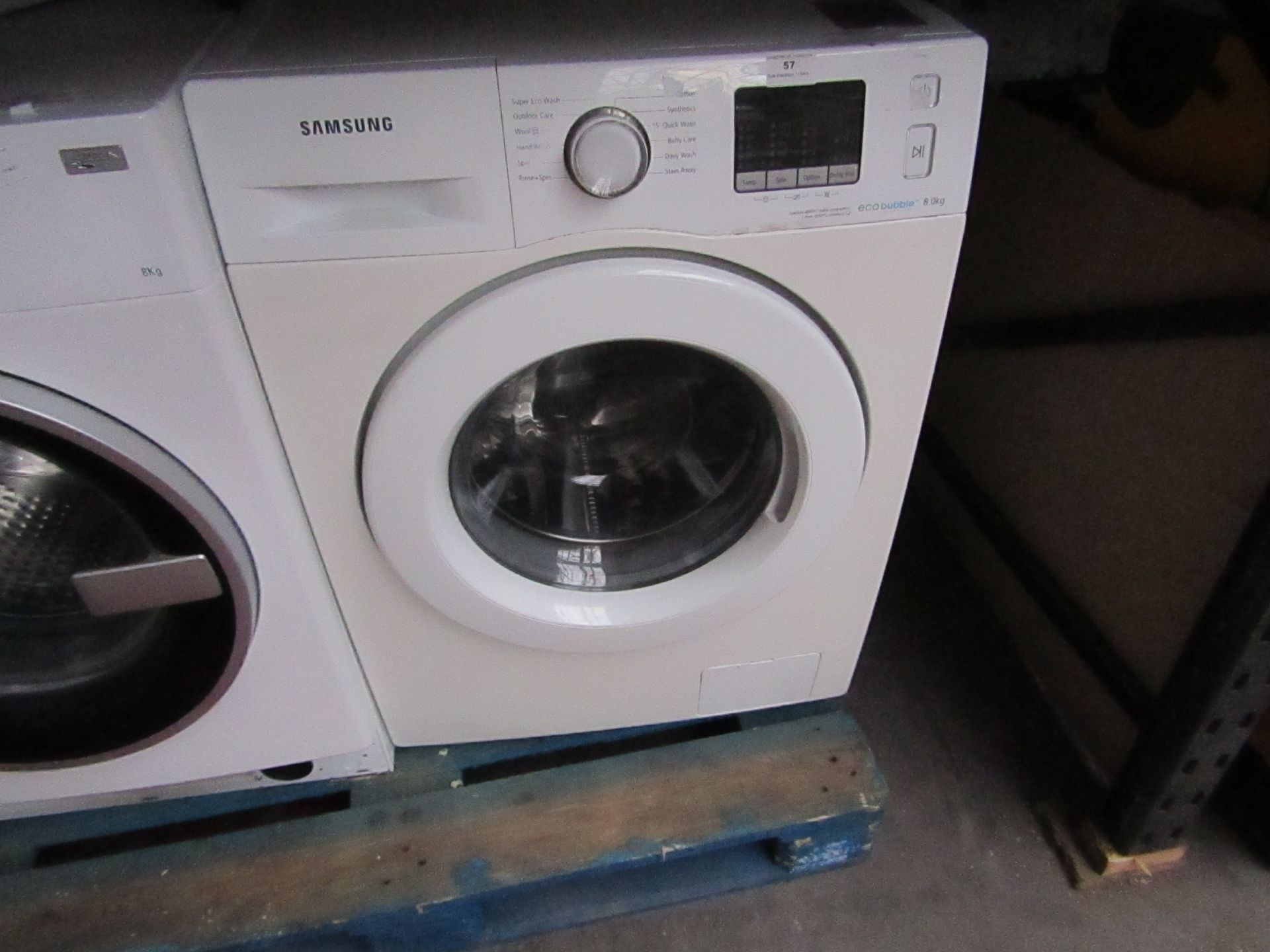 Samsung Eco Bubble 8Kg washing machine, powers on and spins.