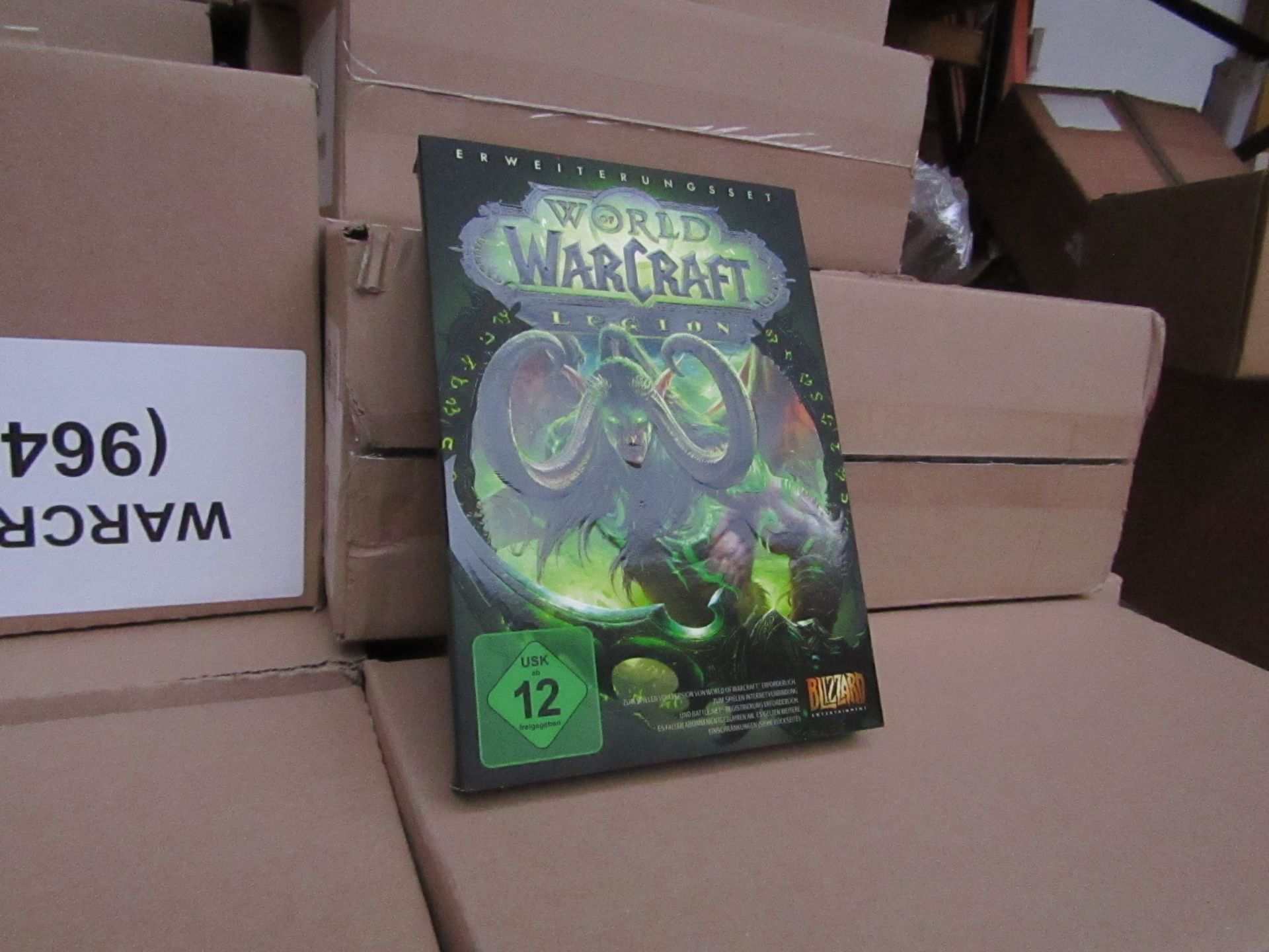 Box of 18x World of Warcraft Legion games, new and still sealed, these games and the packaging are