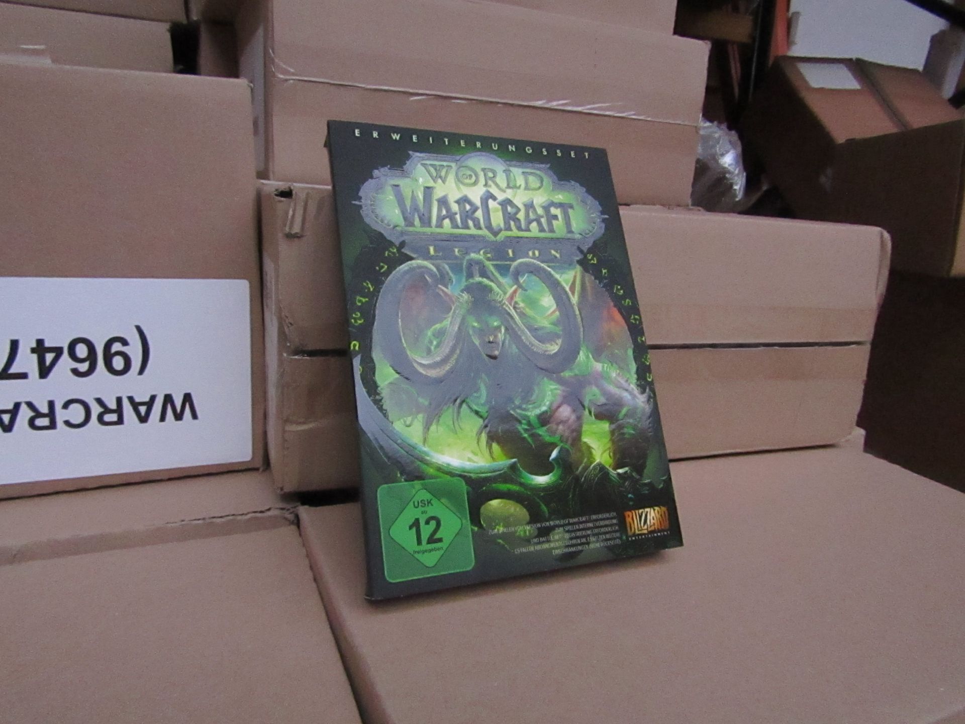 Box of 18x World of Warcraft Legion games, new and still sealed, these games and the packaging are