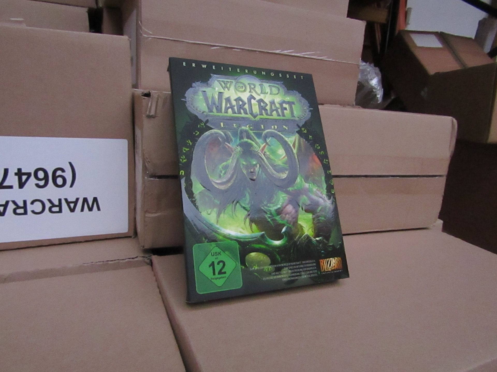 Box of 18x World of Warcraft Legion games, new and still sealed, these games and the packaging are