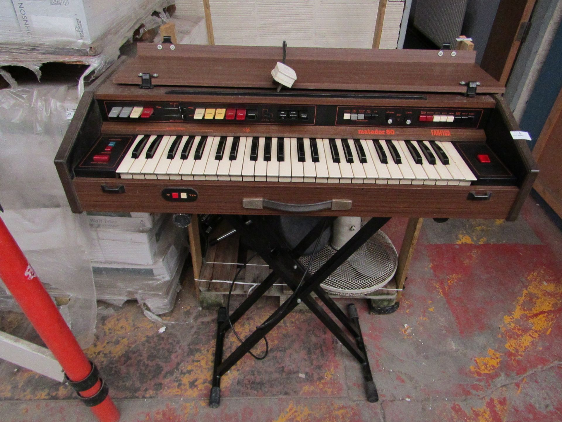 Farfisa Matador 80 Vintage Organ sat on a Fold away Keyboard stand, powers on but we haven't