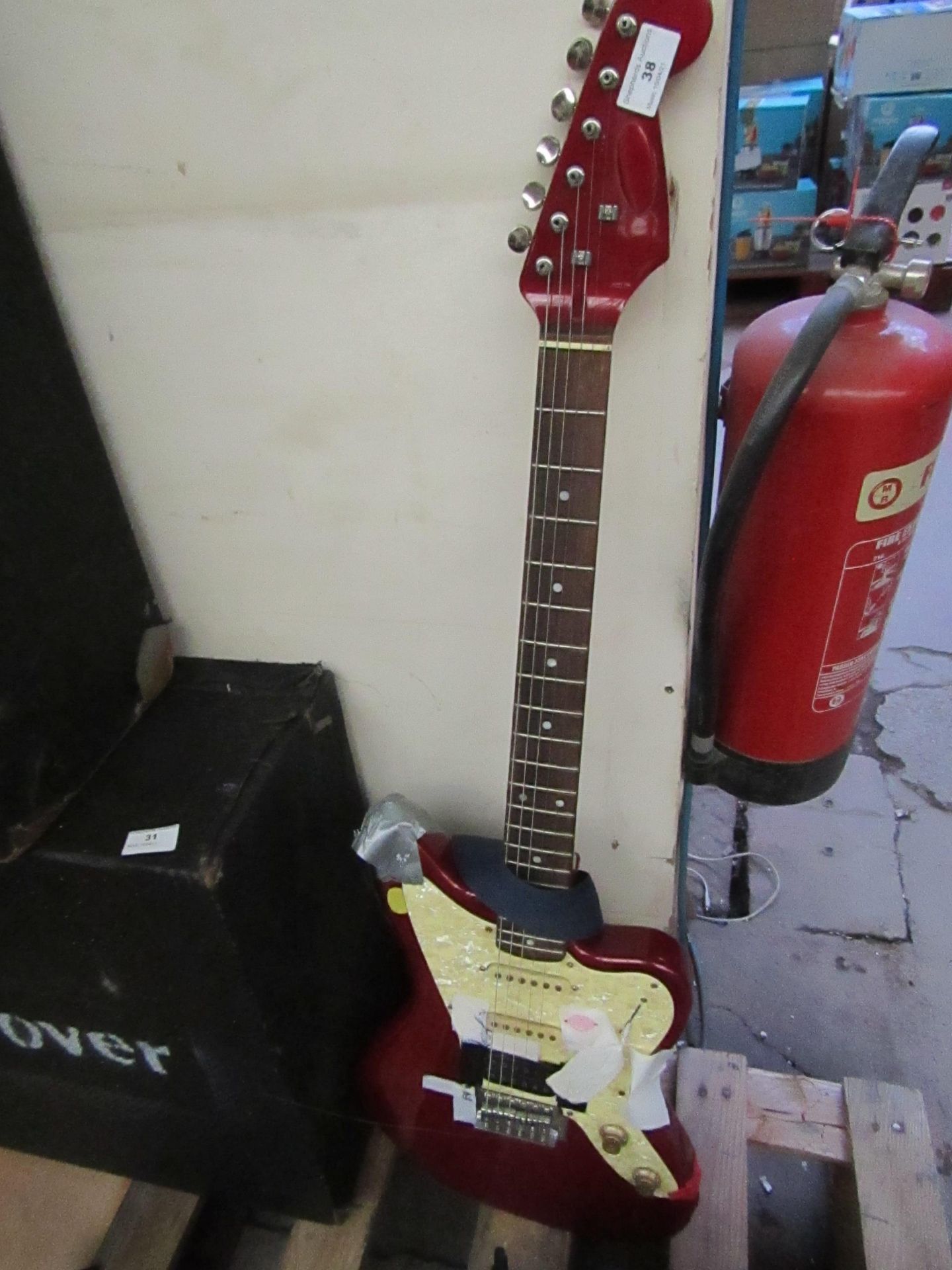 Stagg Guitar, looks like it needs some repairs as it has tape all over it. please read lot 0