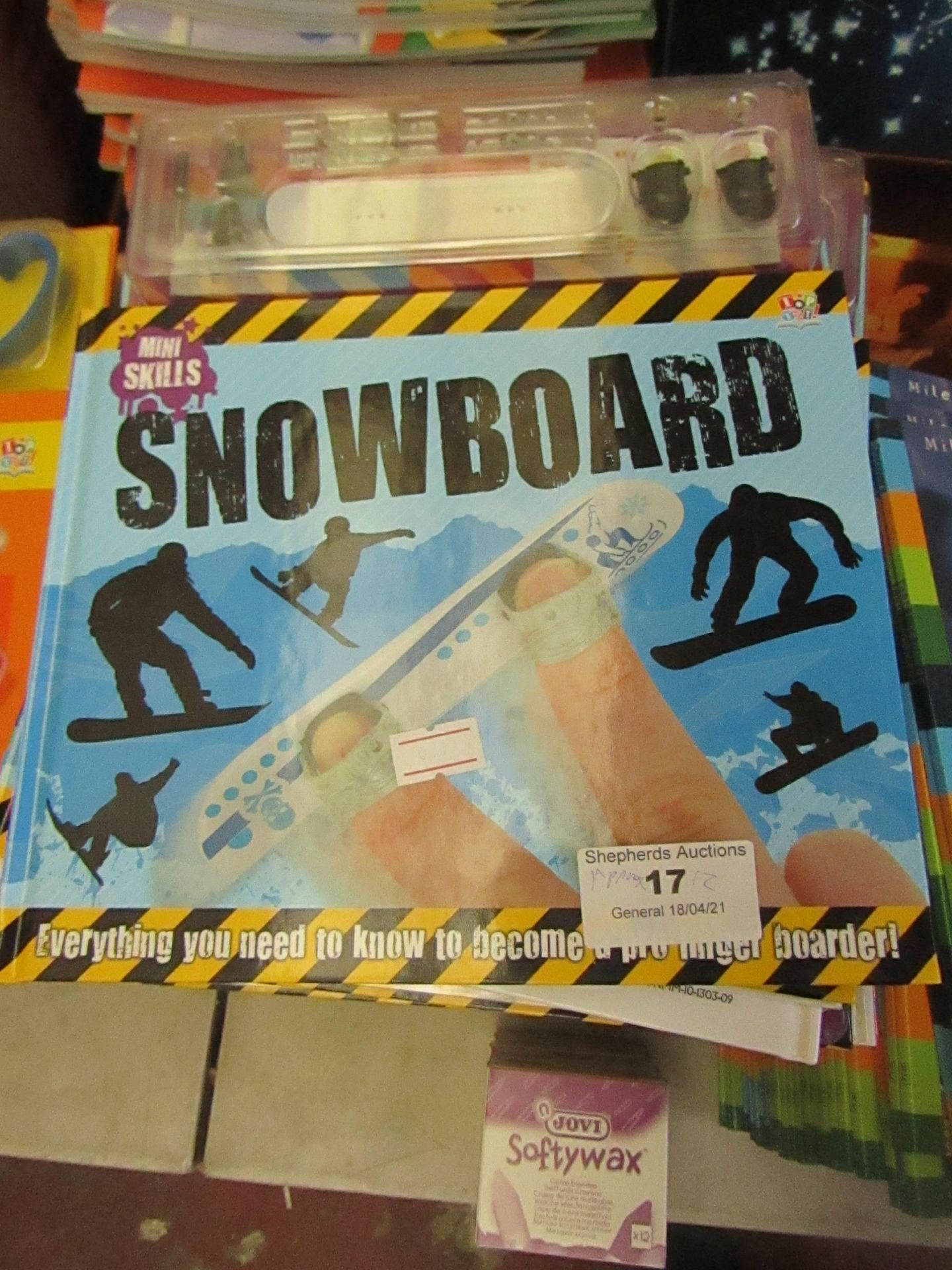 Approx 12x Snowboard mini skills book, new.