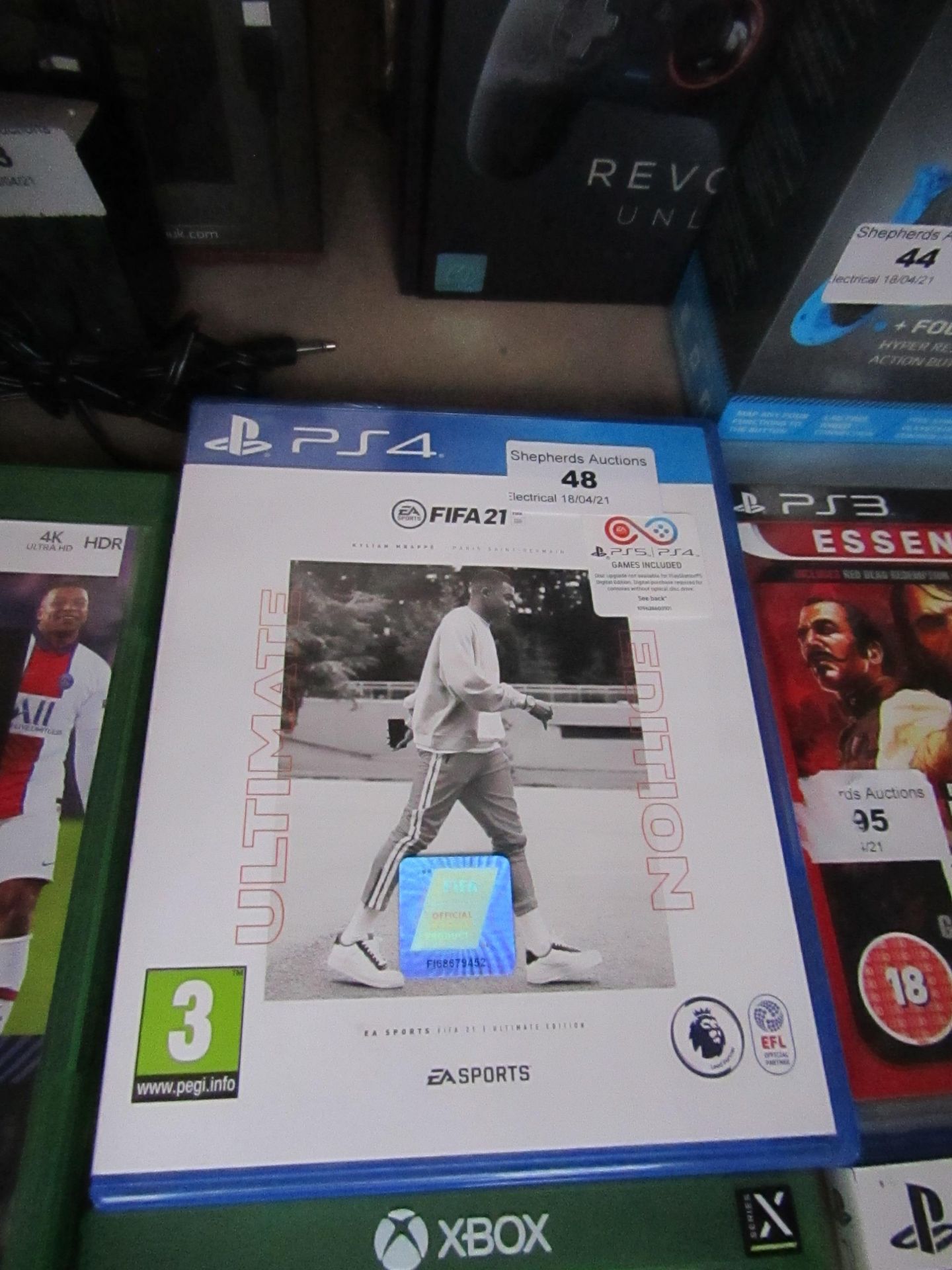 Playstation 5 FIFA 21 Ultimate Edition, untested but appears to have scratches on the disk and we