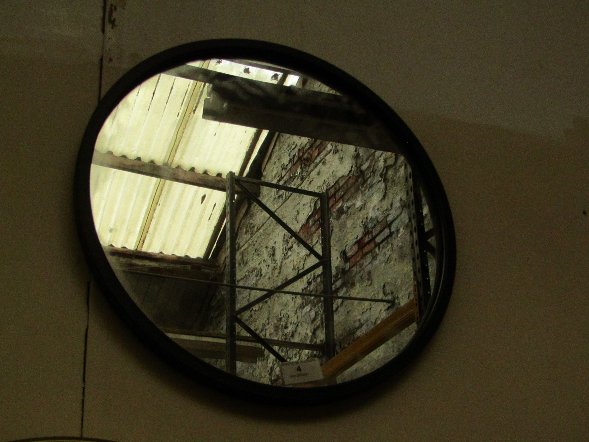 1 X Black Framed Circular Mirror approx 30cm (hanging bracket is bent on the back)