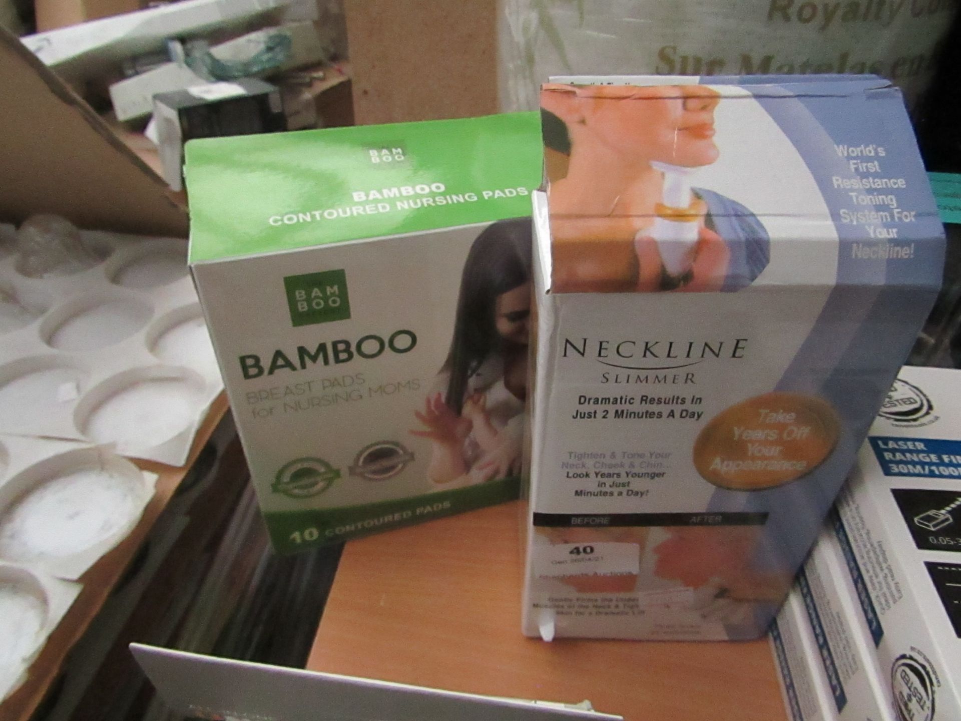 1x Neckline Slimmer - Unchecked & Boxed. 1x Bamboo - Breast Pads For Nursing Mum's - Unchecked &