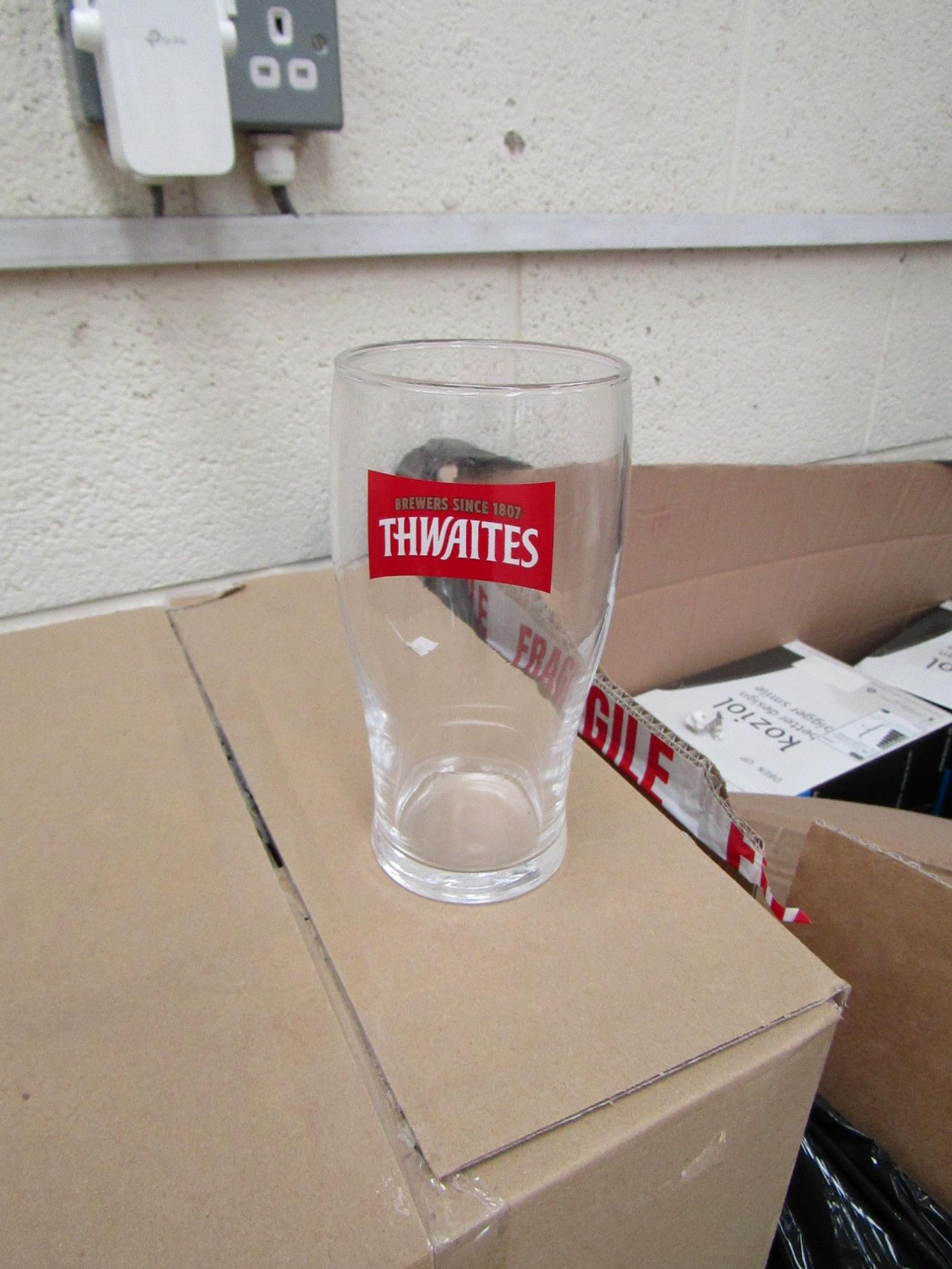 2x boxes of 12x Thwaites Pint Glasses - New & Boxed.