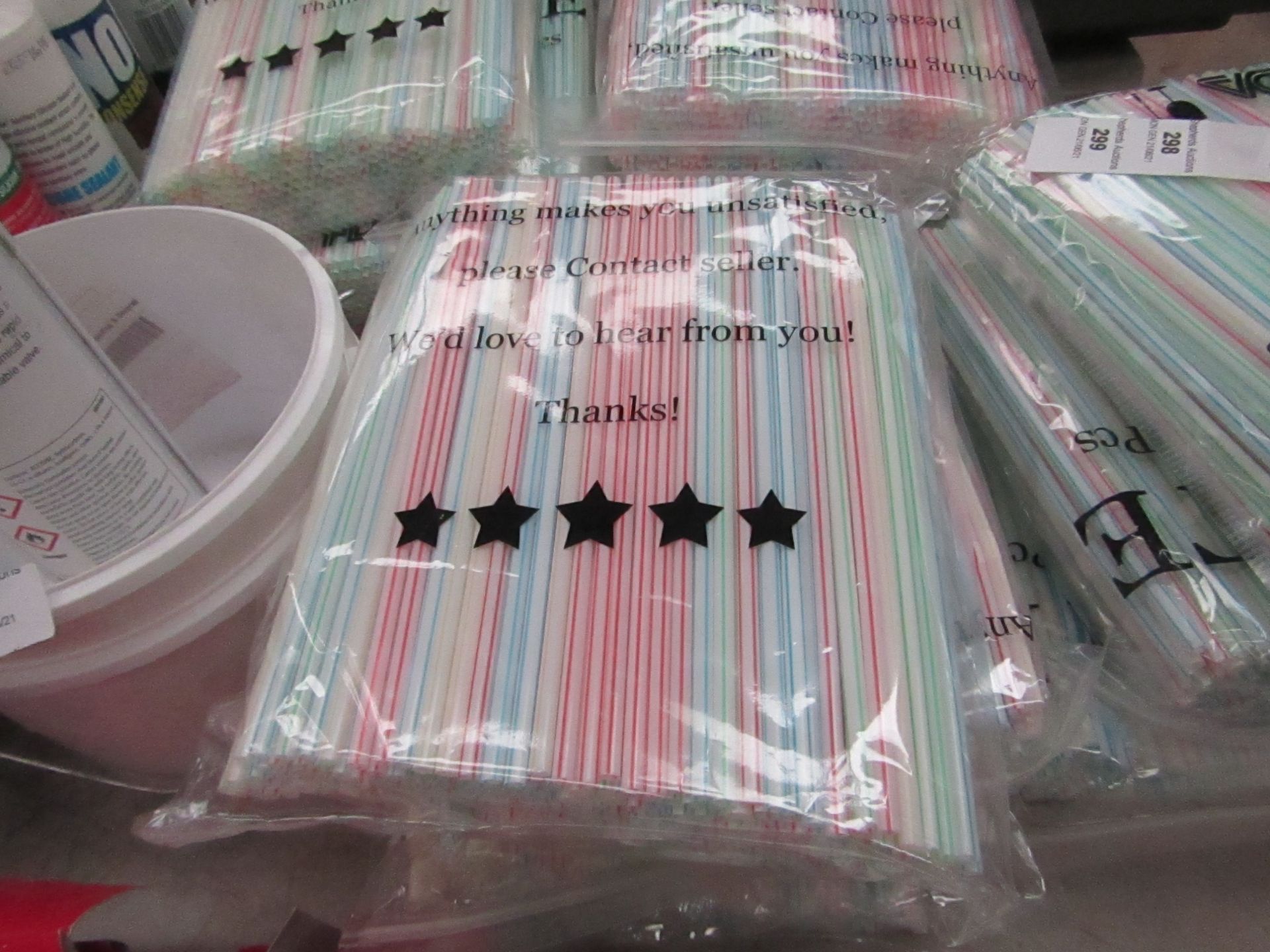 4x Packs of approx 200x plastic straws, new and packaged.