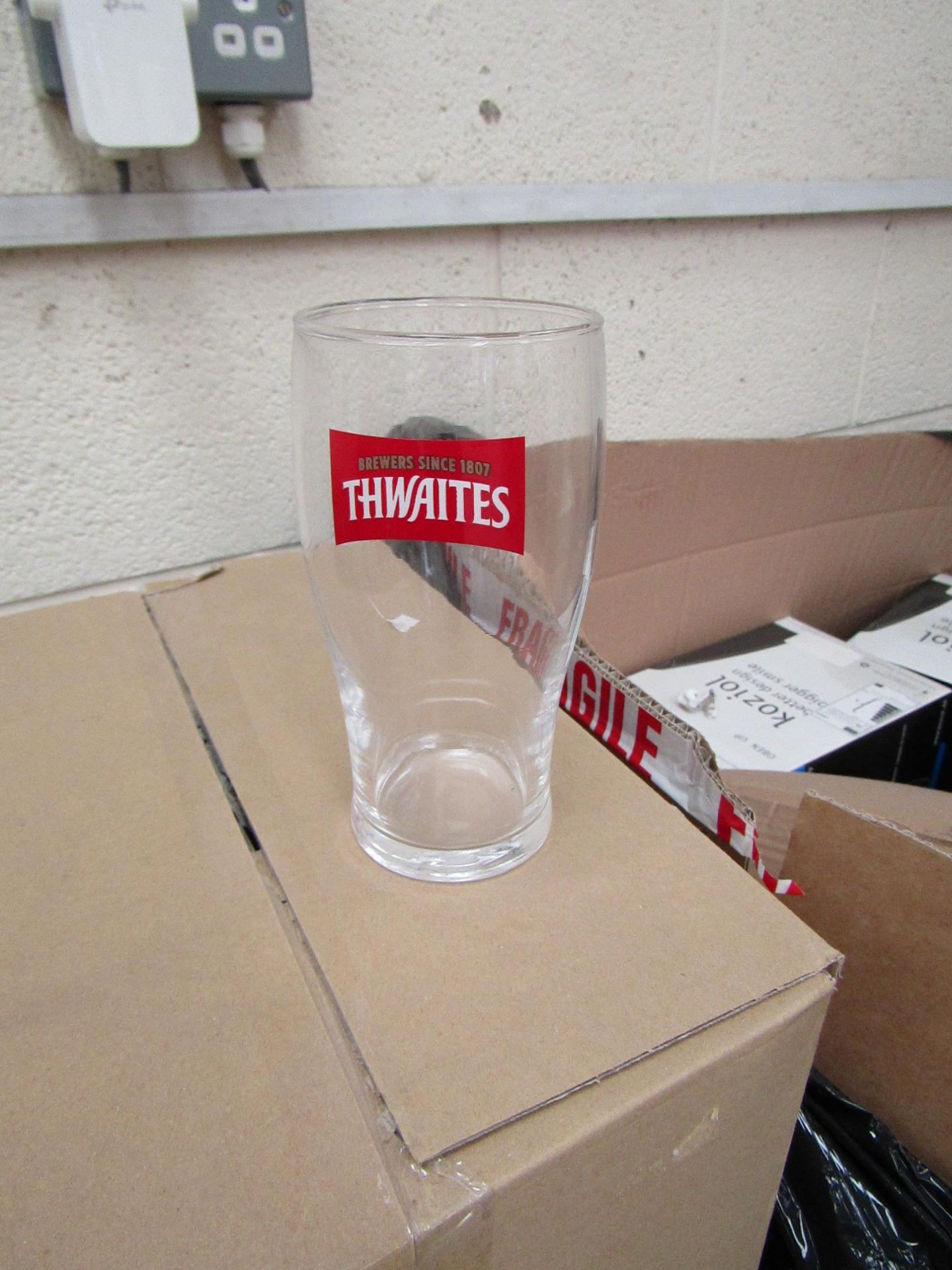 2x boxes of 12x Thwaites Pint Glasses - New & Boxed.