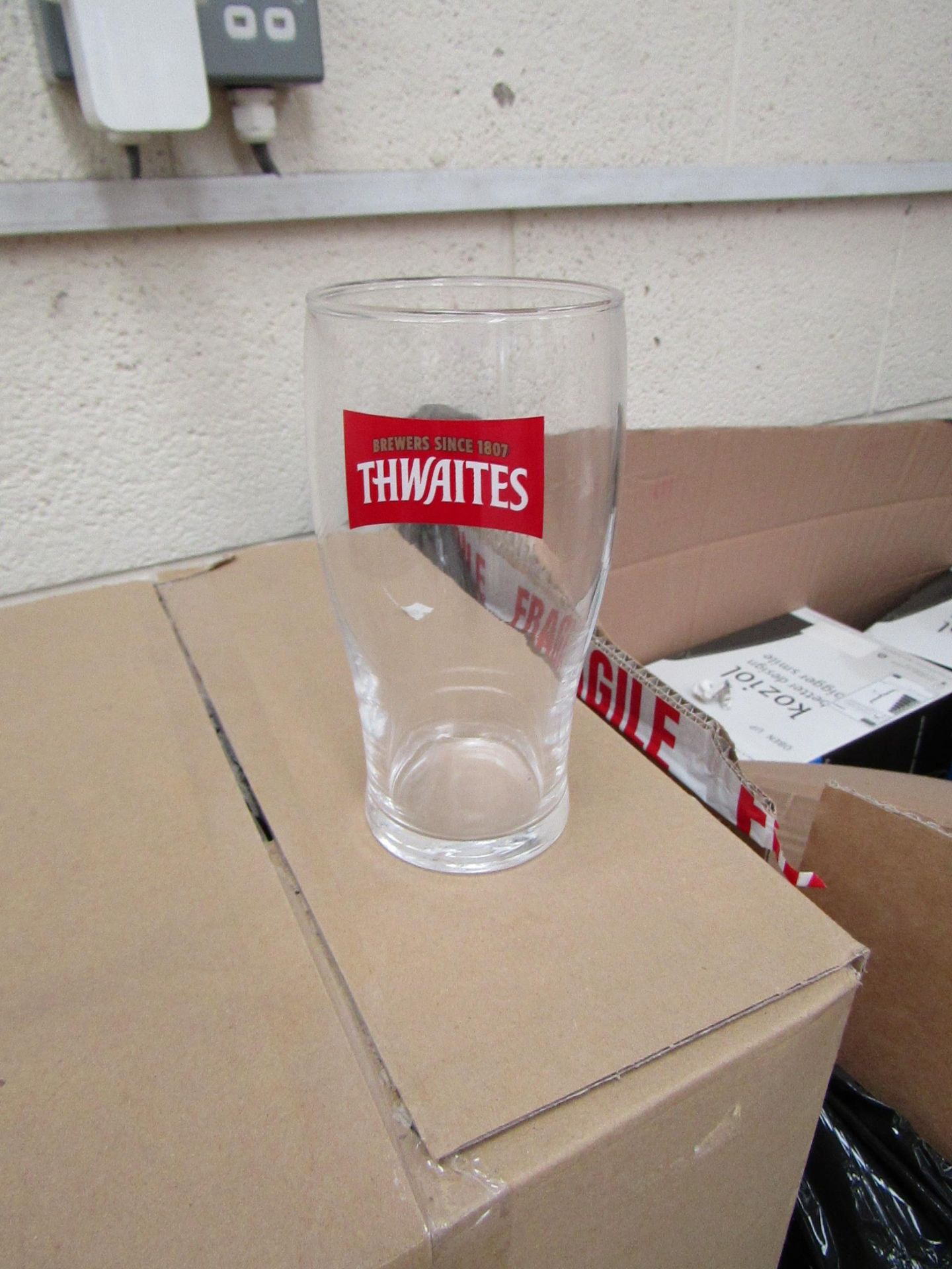 2x boxes of 12x Thwaites Pint Glasses - New & Boxed.