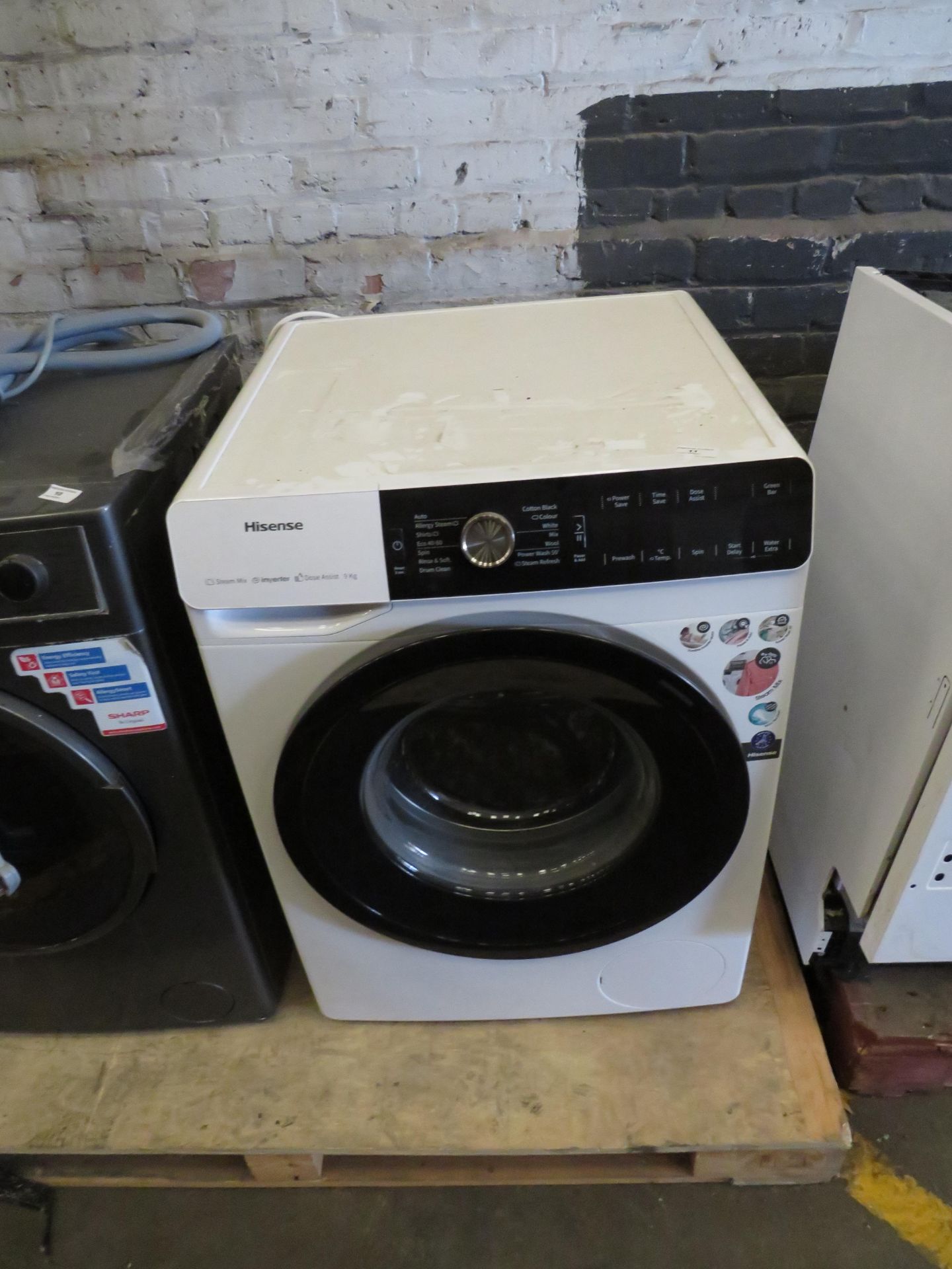 Hisense 9KG washing machine with dose assist, powers on and the drum spins but we have not connected
