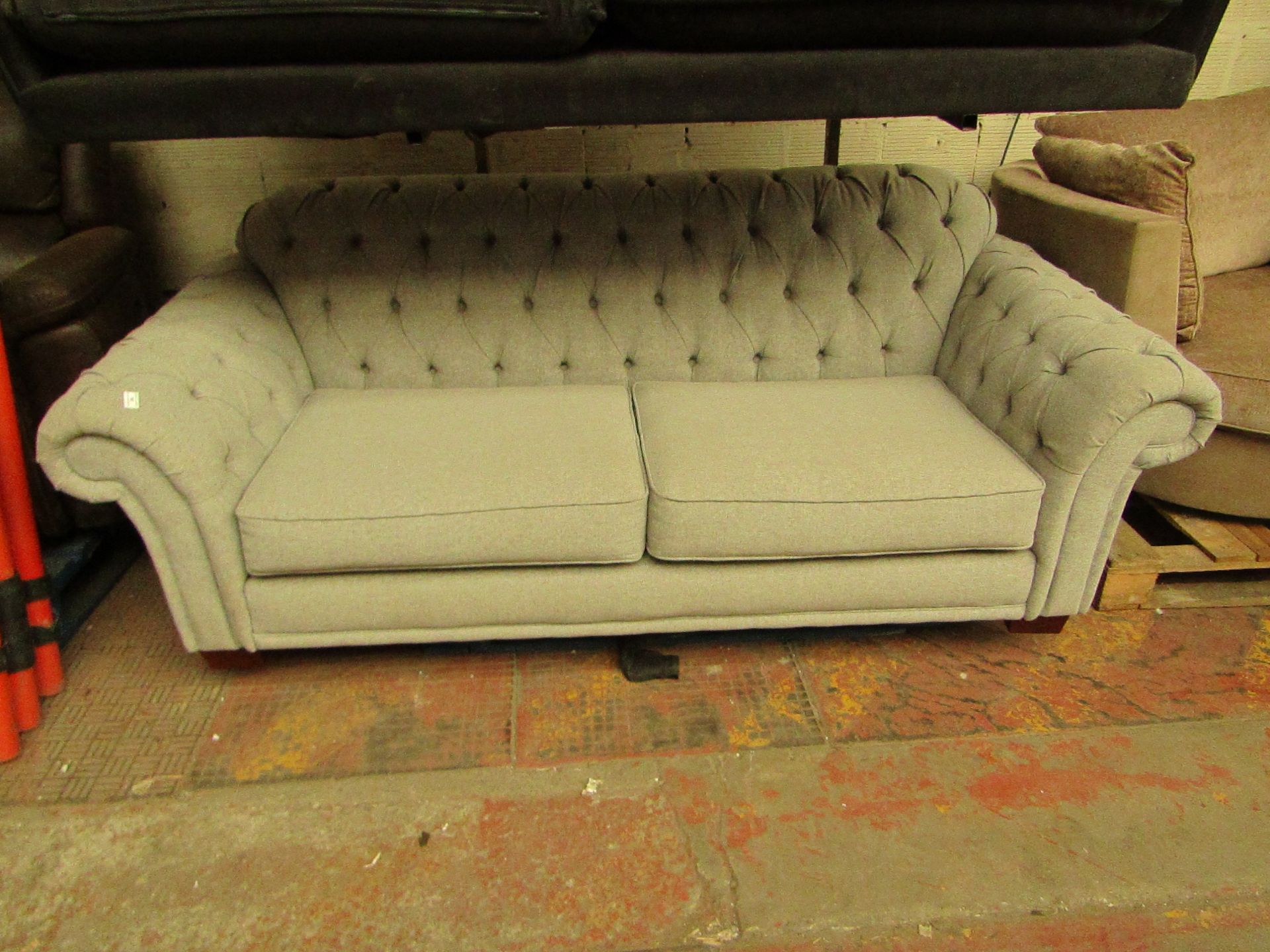 Costco 3 seater button back sofa, no major damage and includes feet.