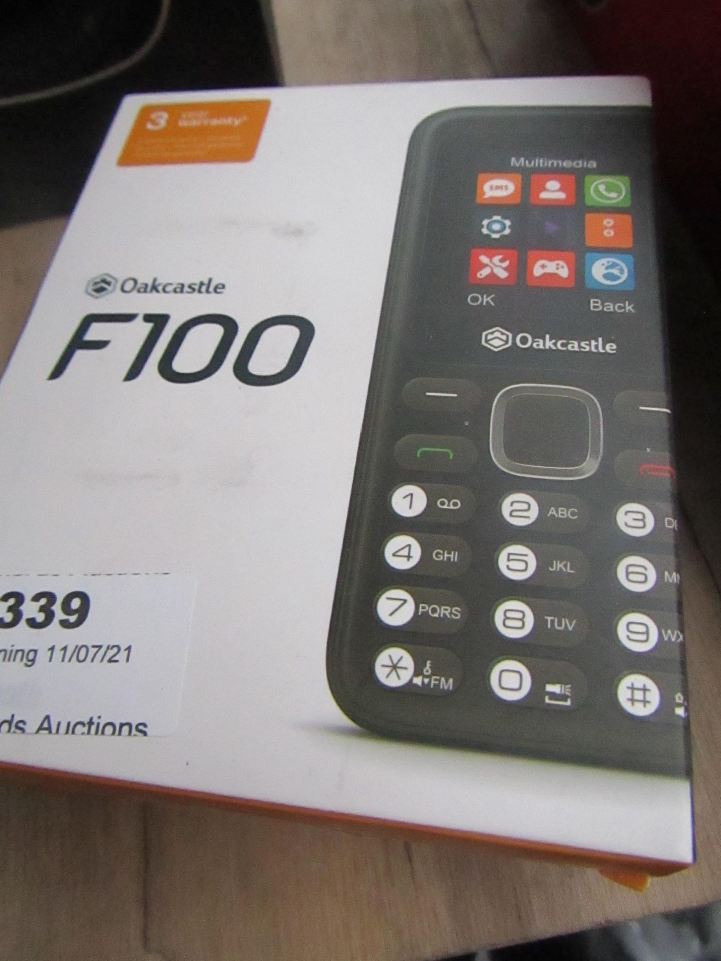 Oak Castle F100 mobile phone with bluetooth, unchecked and boxed.