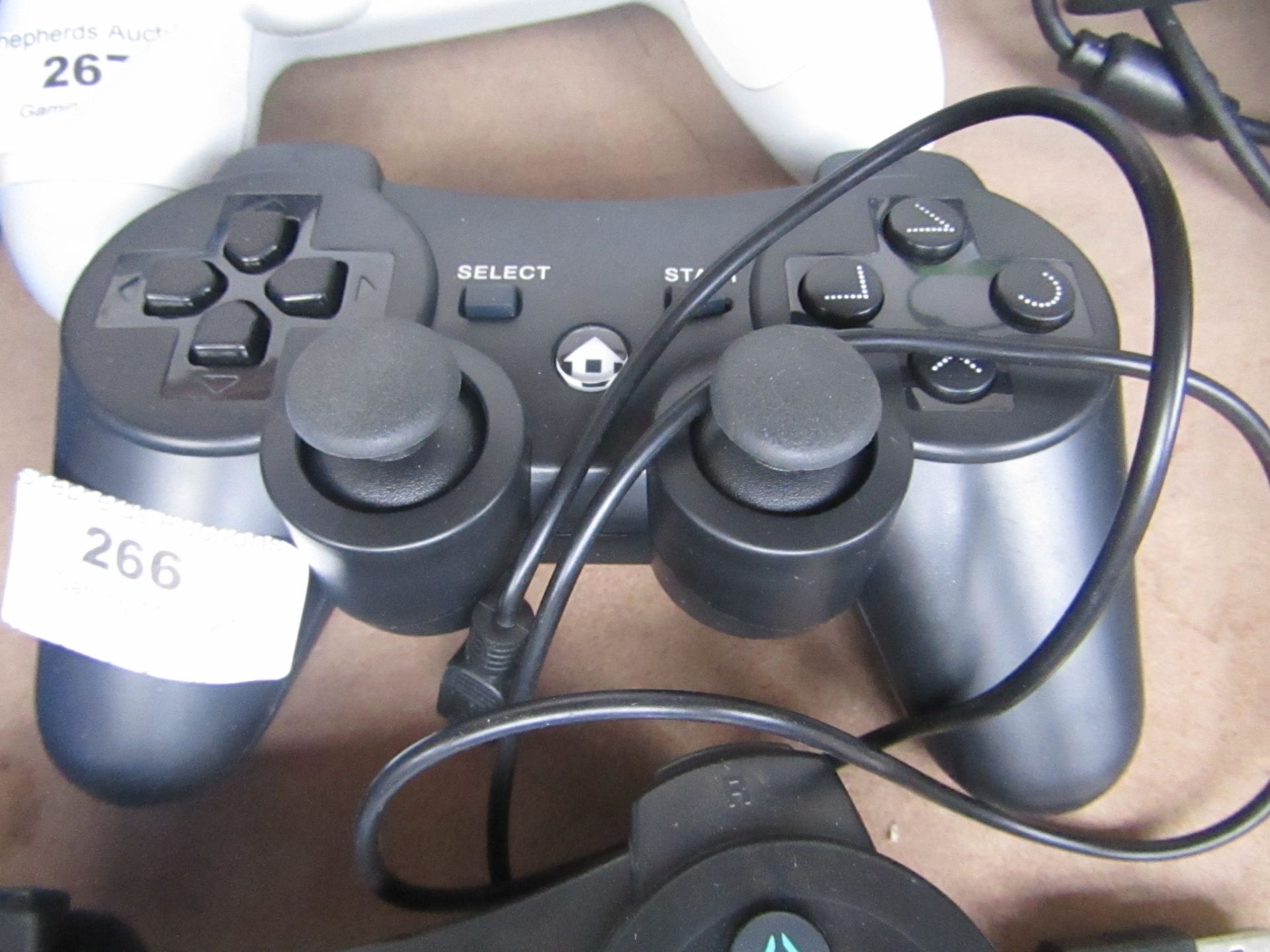 Unbranded PS4 controller, unchecked, with charging cable