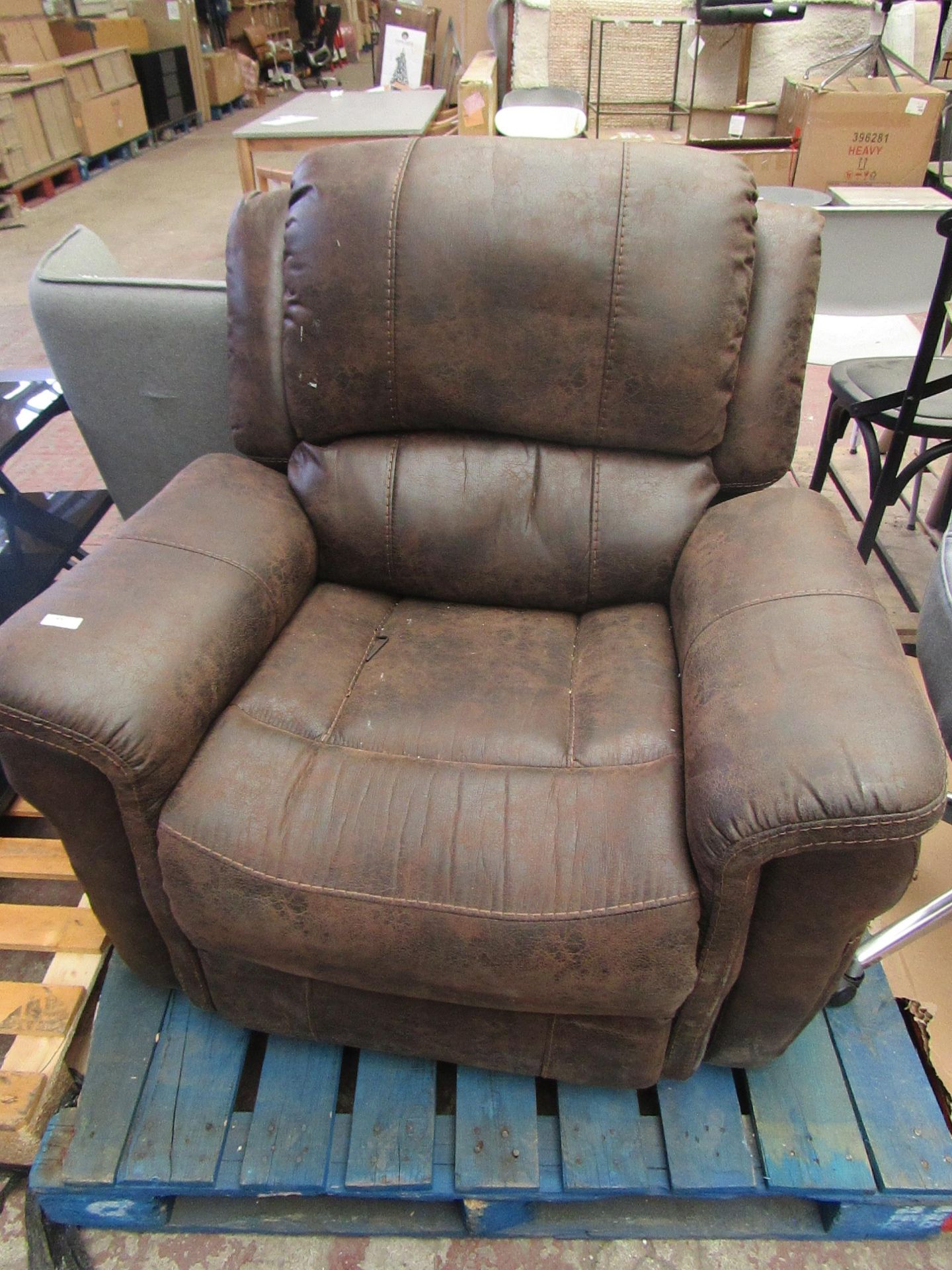 Costco brown leather electric recliner, unchecked for power but overall condition has no major