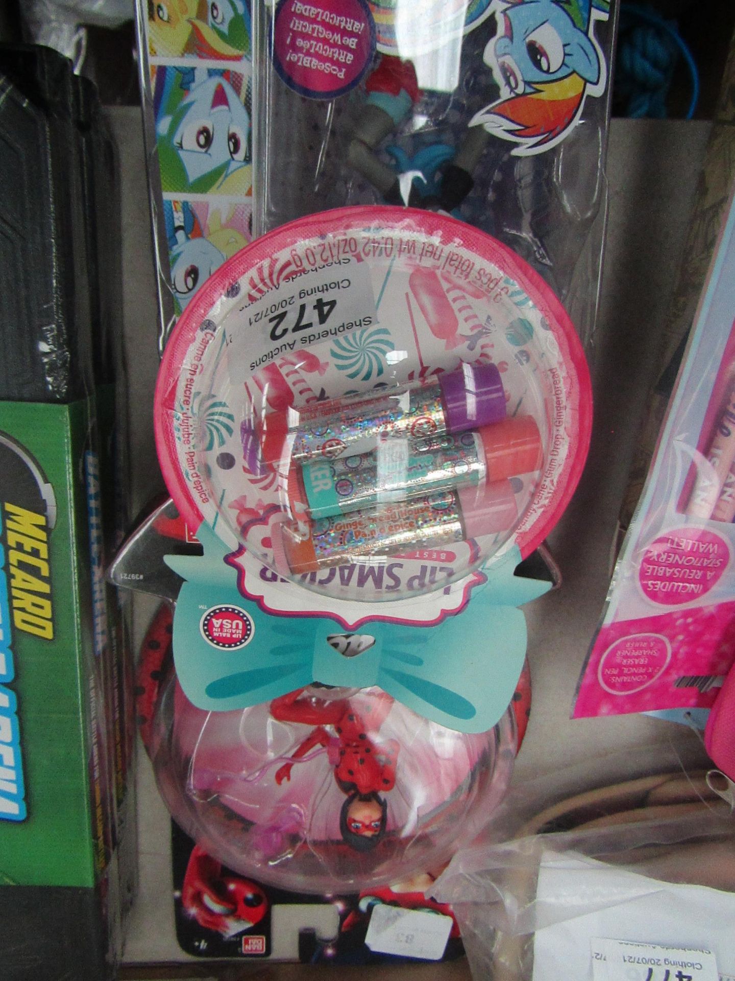 3 various items being 1 x Lip Smackers - flavours being - candy cane / gum drop / gingerbread -