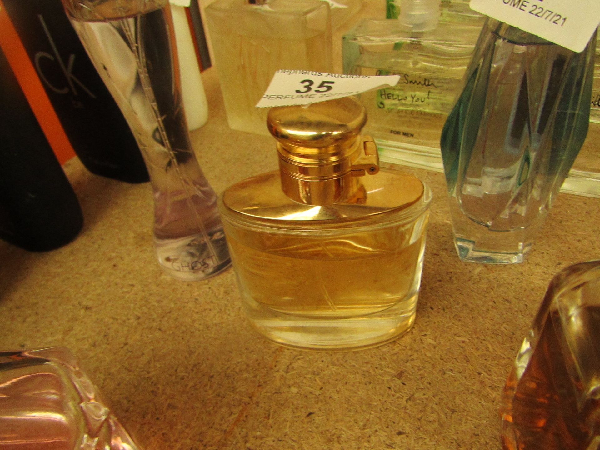 Ralph Lauren Woman. 50ml. 80% Full. RRP £52