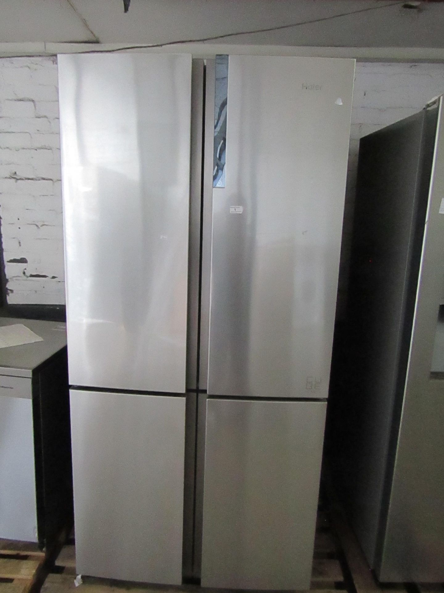 Haier HTF-610DM7 American Fridge Freezer - Powers on & Gets Cold Inside, has a few marks and small